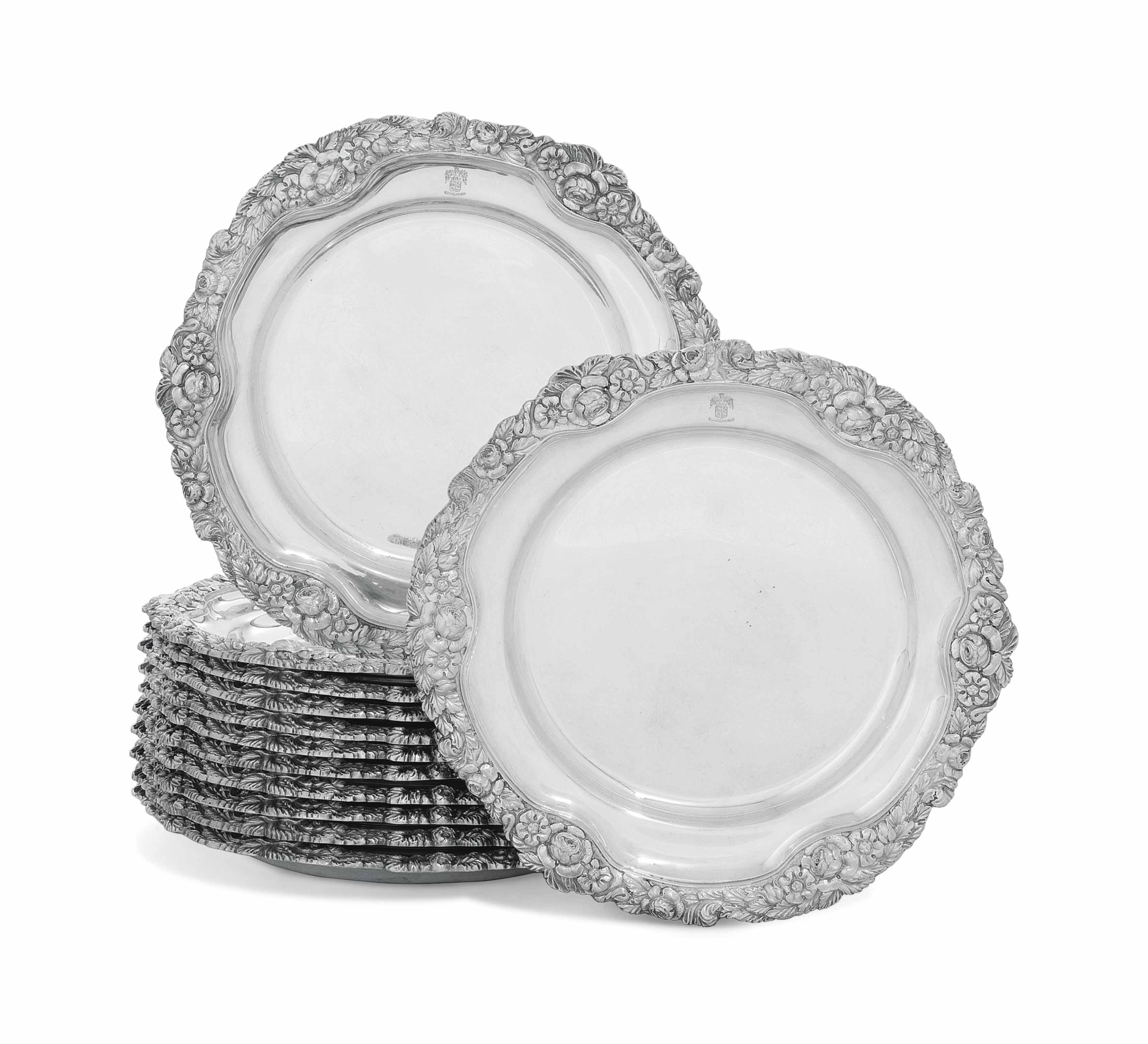 A SET OF TWELVE IRISH SILVER DINNERPLATES , MARK OF ROYAL IRISH SILVER LTD., DUBLIN, 1972