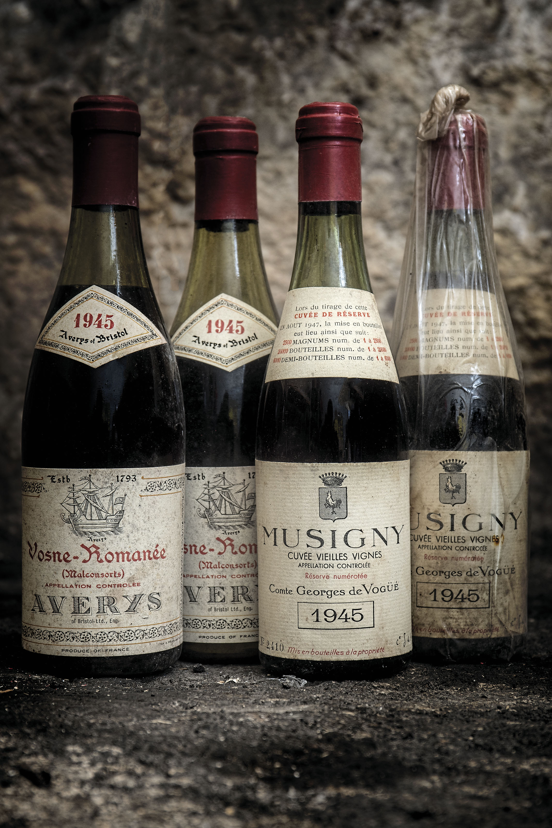 Comte Georges de Vogüé, Musigny, Vieilles Vignes 1945Plain metal capsules. Four bin-soiled labels, one good appearance. Levels... 