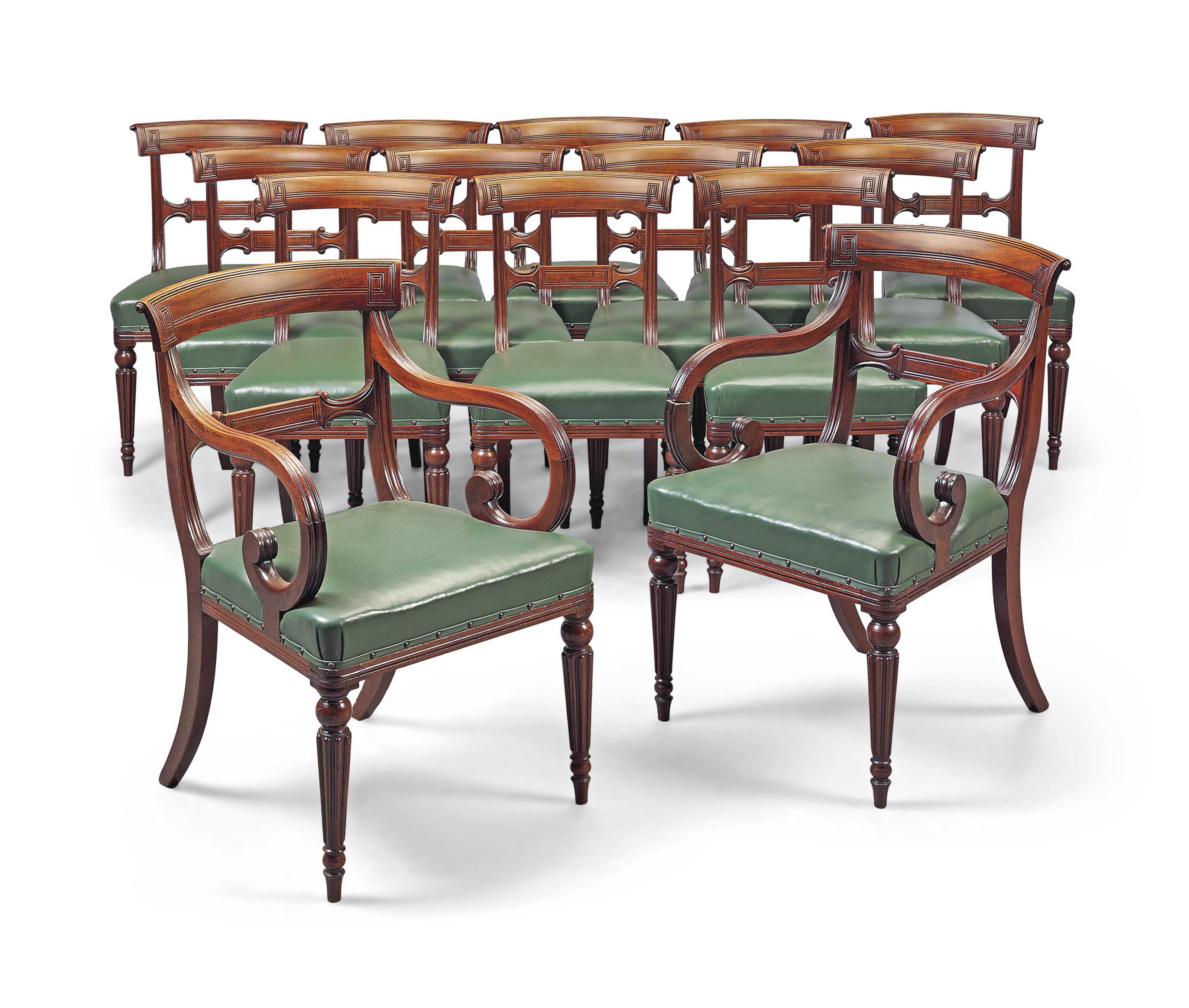 A SET OF FOURTEEN REGENCY MAHOGANY DININGCHAIRS