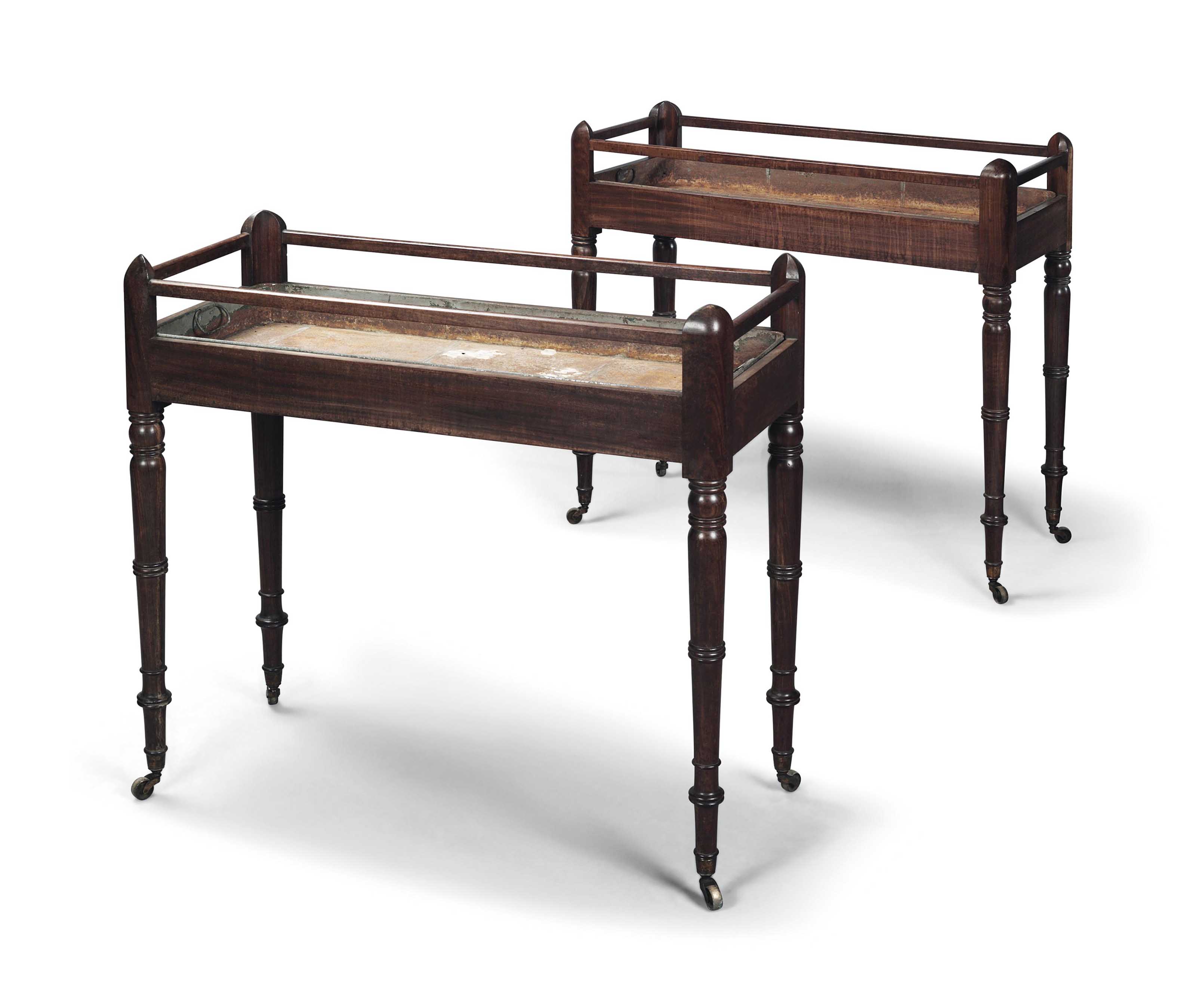 A PAIR OF IRISH REGENCY MAHOGANY RECTANGULAR PLANT STANDS