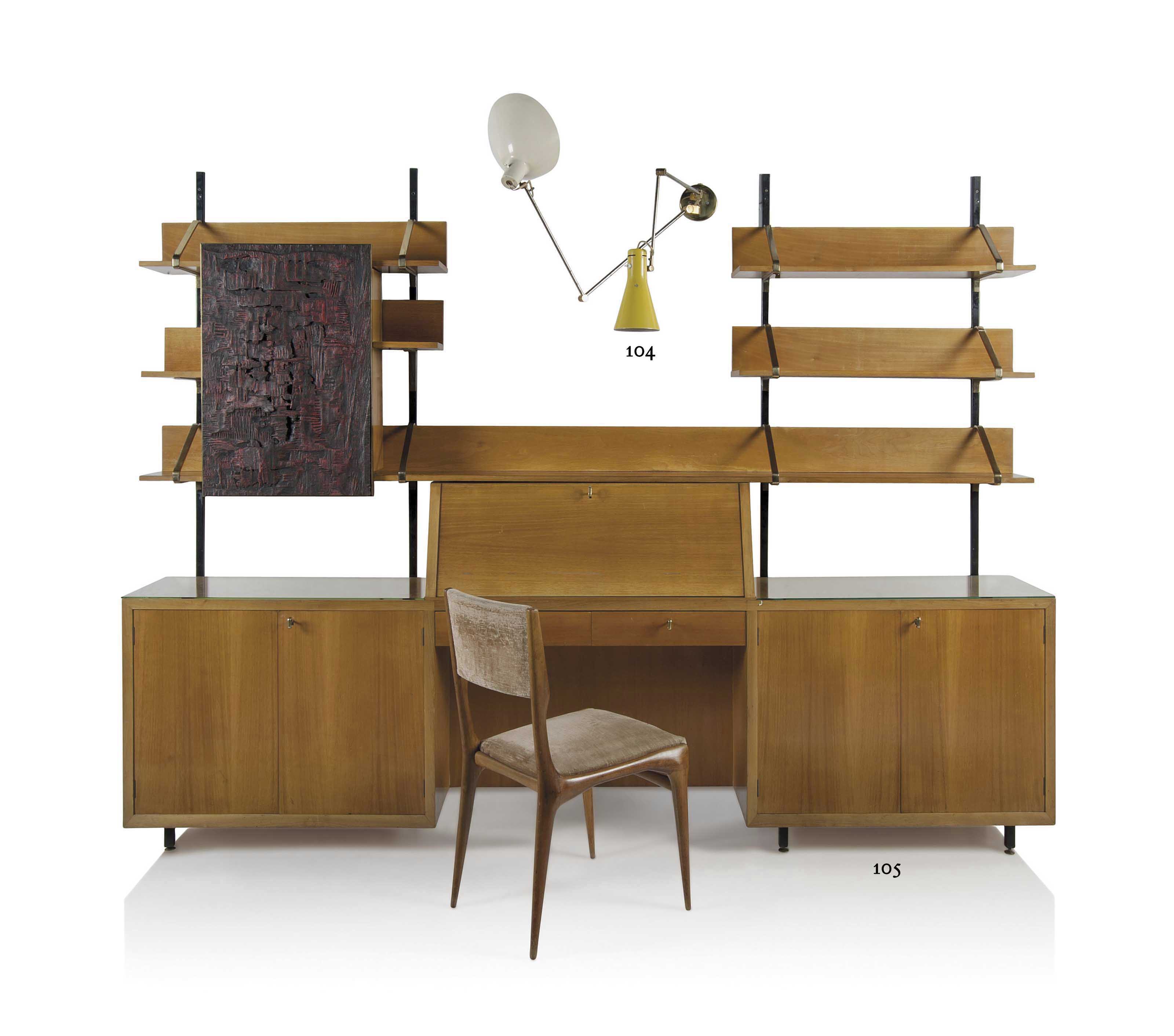 Carlo de Carli (1910-1999), A unique bureau, circa 1960. Walnut and walnut veneer, brass, painted metal, the cabinet door with a panel by Agenore Fabbri, &lsquo;Personaggio I&rsquo;, 1961, together with the original chair. 80&frac12; in (204 cm) high; 105&frac12; in (268 cm) wide; 14&frac14; in (36 cm) deep. Estimate: &pound;6,000-9,000. This lot is offered in Design on 26 October 2016 at Christie&rsquo;s in London, King Street