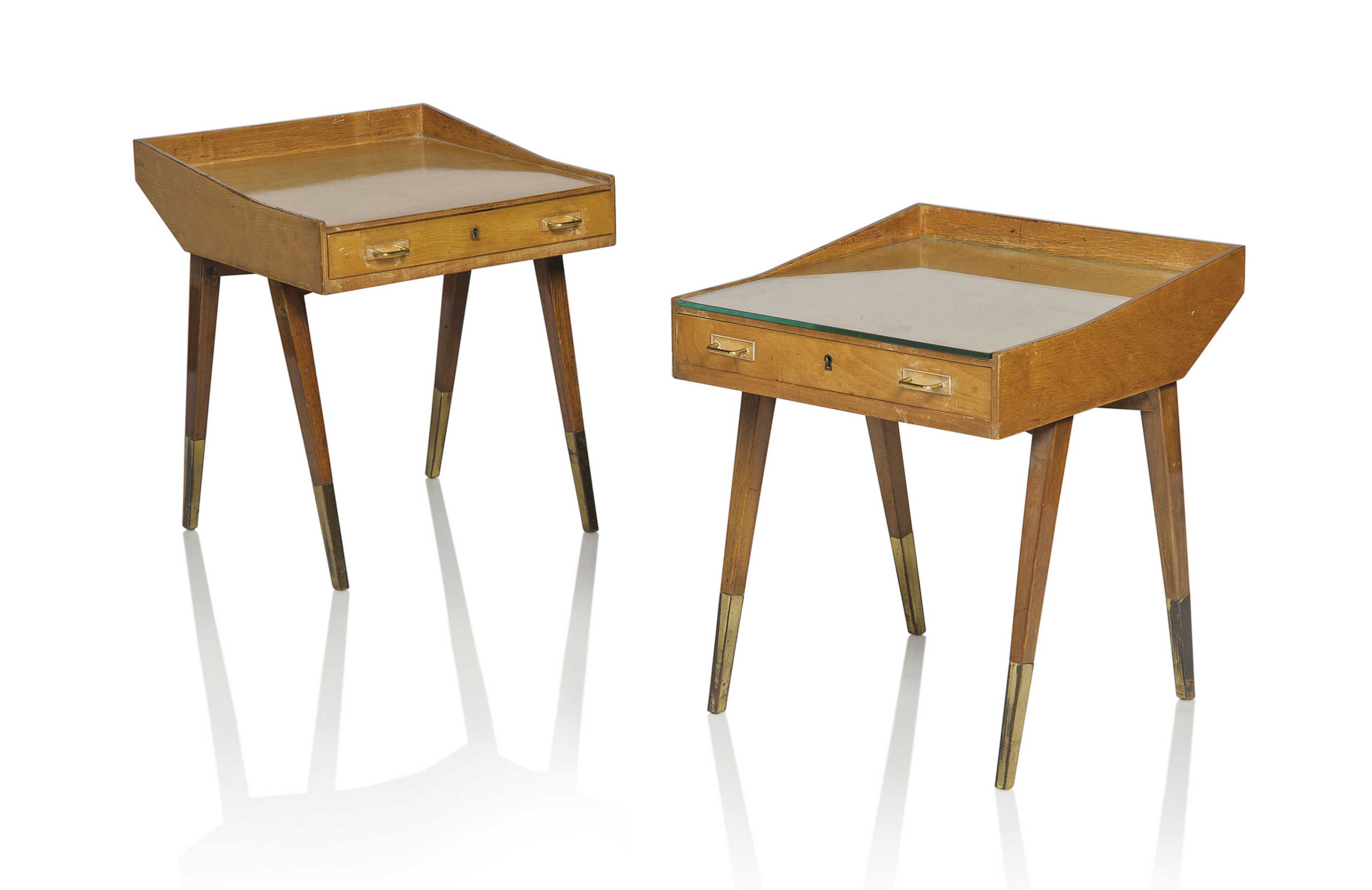 Carlo de Carli (1910-1999), A pair of bedside tables, 1949. Walnut, birch veneer, brass, glass, acrylic. 19&frac12; in (49.5 cm) high; 16&frac34; in (42.5 cm) wide; 17&frac34; in (45 cm) deep. Estimate: &pound;4,000-6,000. This lot is offered in Design on 26 October 2016 at Christie&rsquo;s in London, King Street