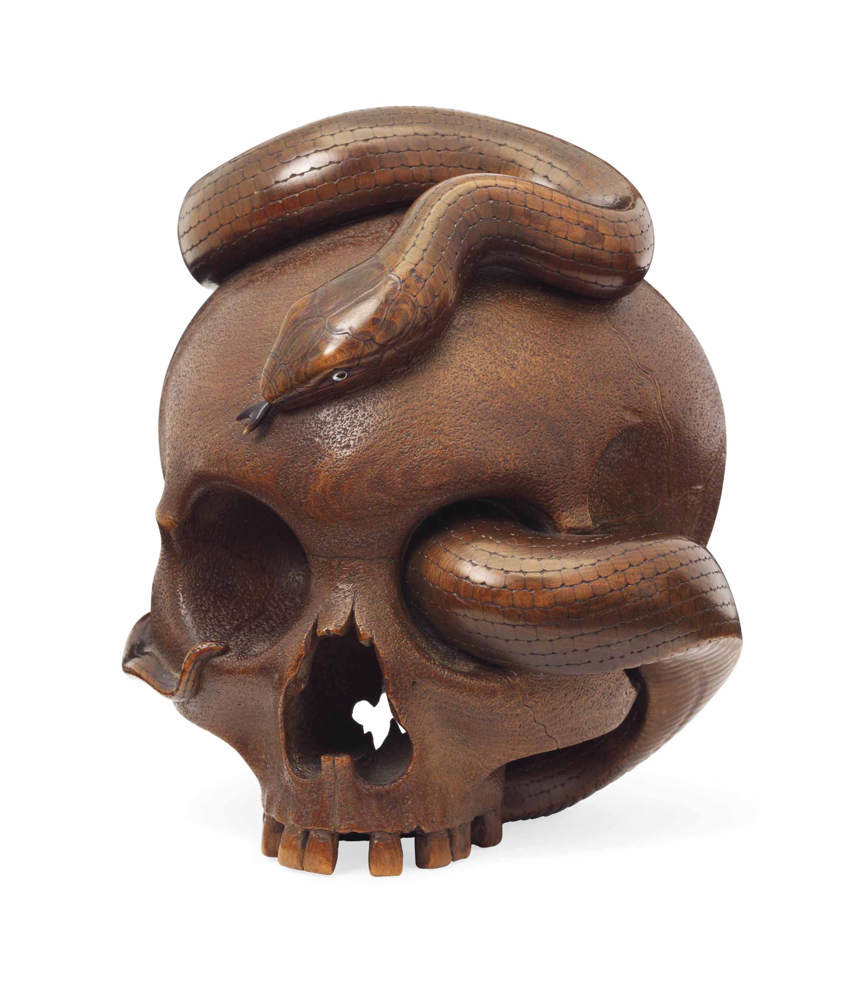 An Ivory Netsuke of a Sage on a Crane, Signed Ikko (Hasegawa Ikko