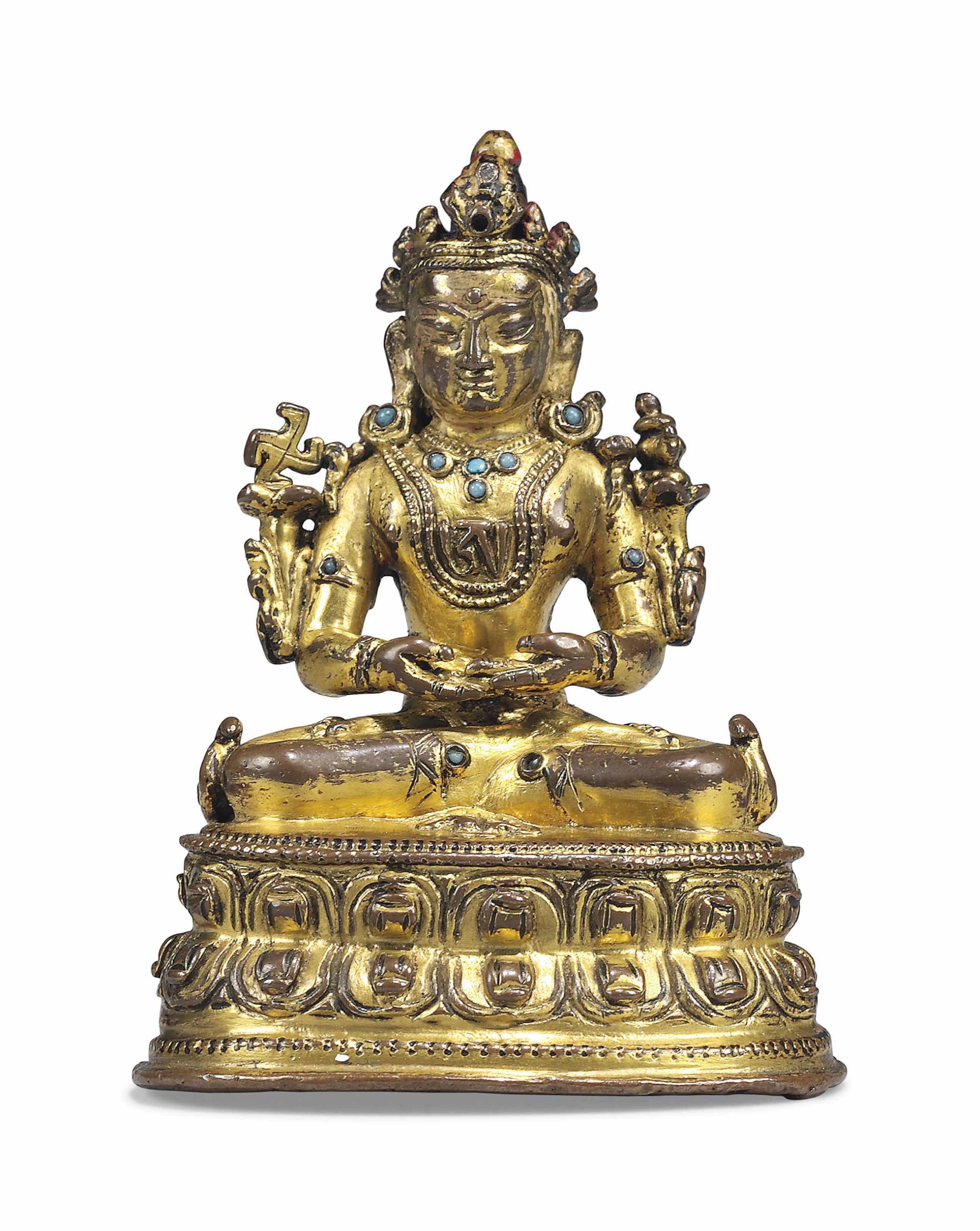A RARE GILTBRONZE FIGURE OF A BON DEITY , TIBET, LATE 15TH CENTURY