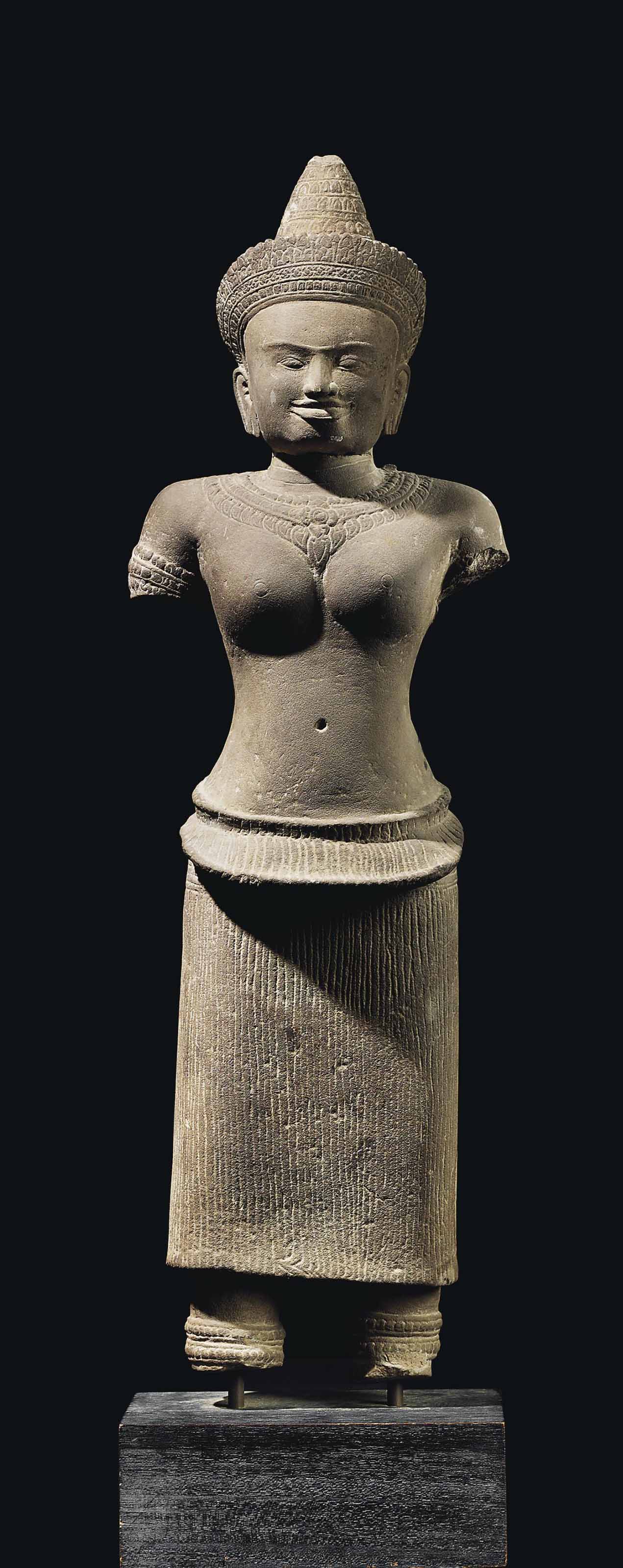 A SANDSTONE FIGURE OF LAKSHMI, CAMBODIA, KHMER, ANGKOR WAT