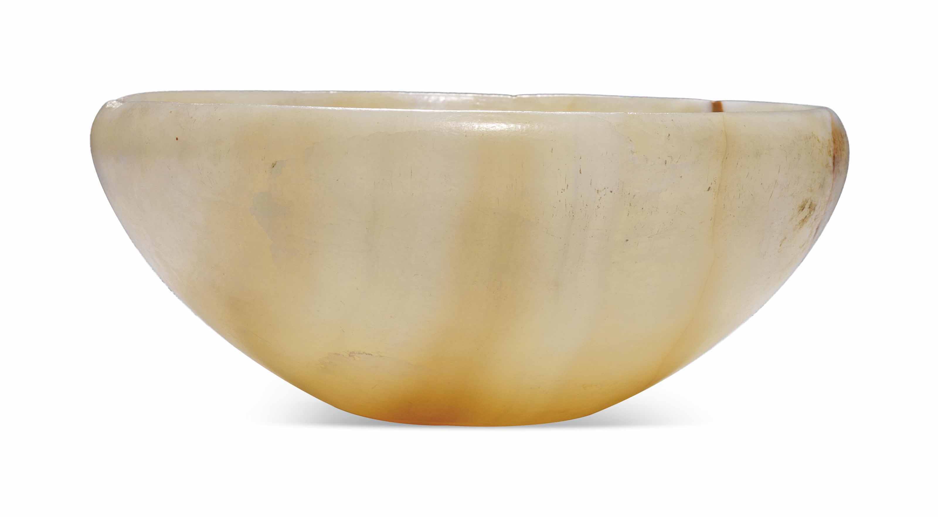 AN EGYPTIAN ALABASTER BOWL , OLD KINGDOM, CIRCA 26862160 B.C. Christie's