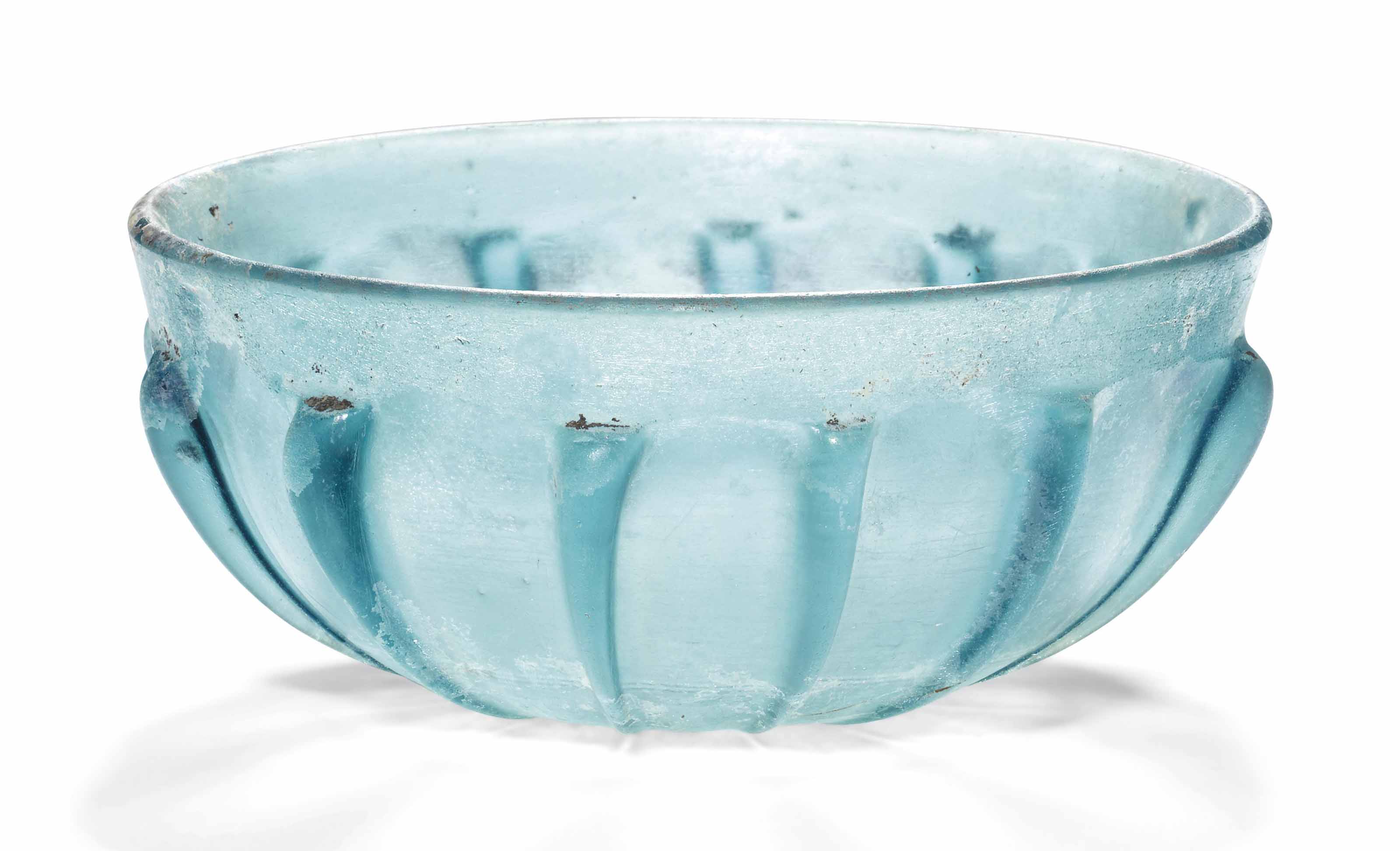 A ROMAN BLUE GLASS RIBBED BOWL , CIRCA LATE 1ST CENTURY B.C.1ST
