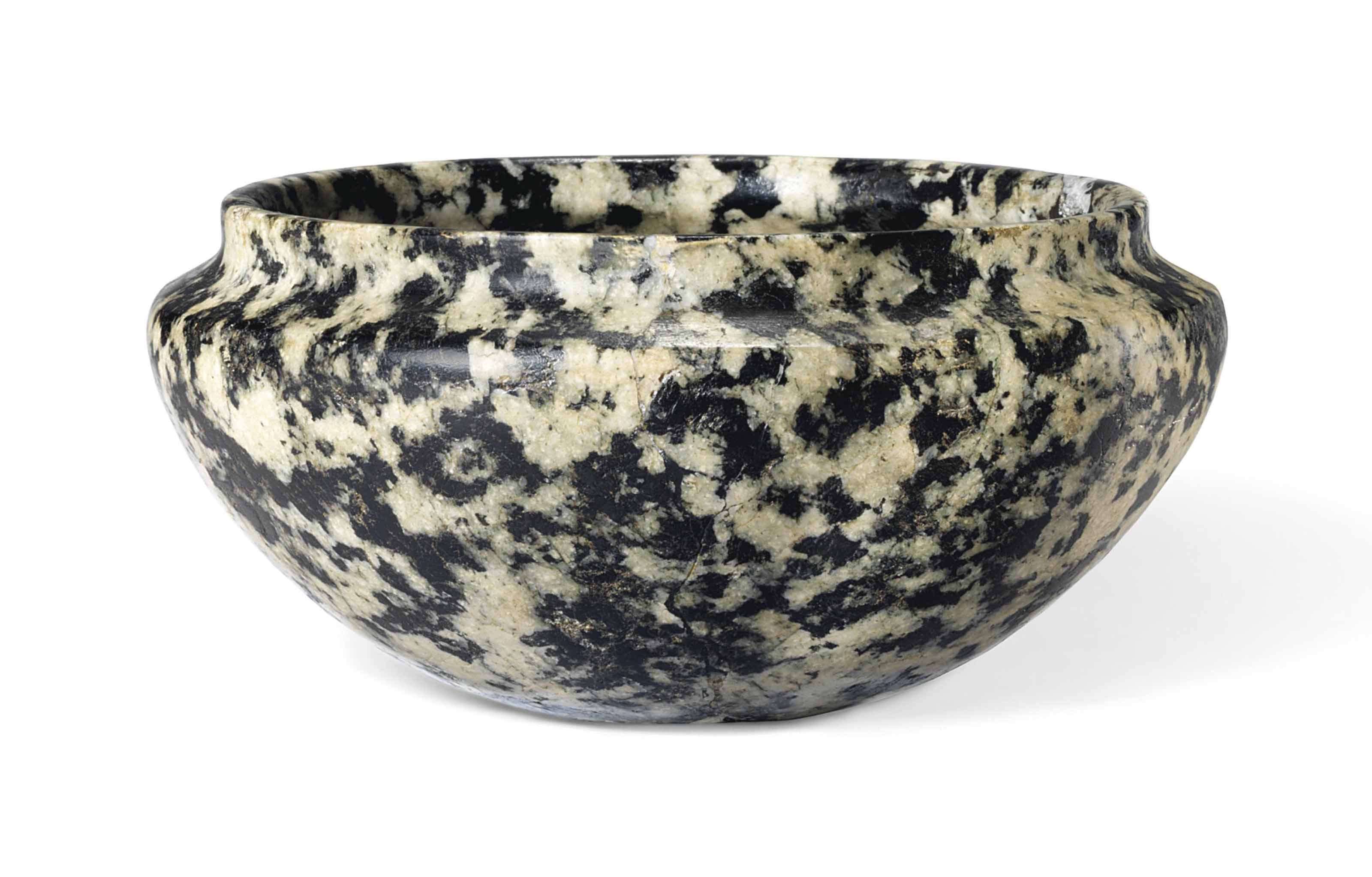 AN EGYPTIAN PORPHYRITIC DIORITE BOWL , EARLY DYNASTIC PERIOD, 3RD