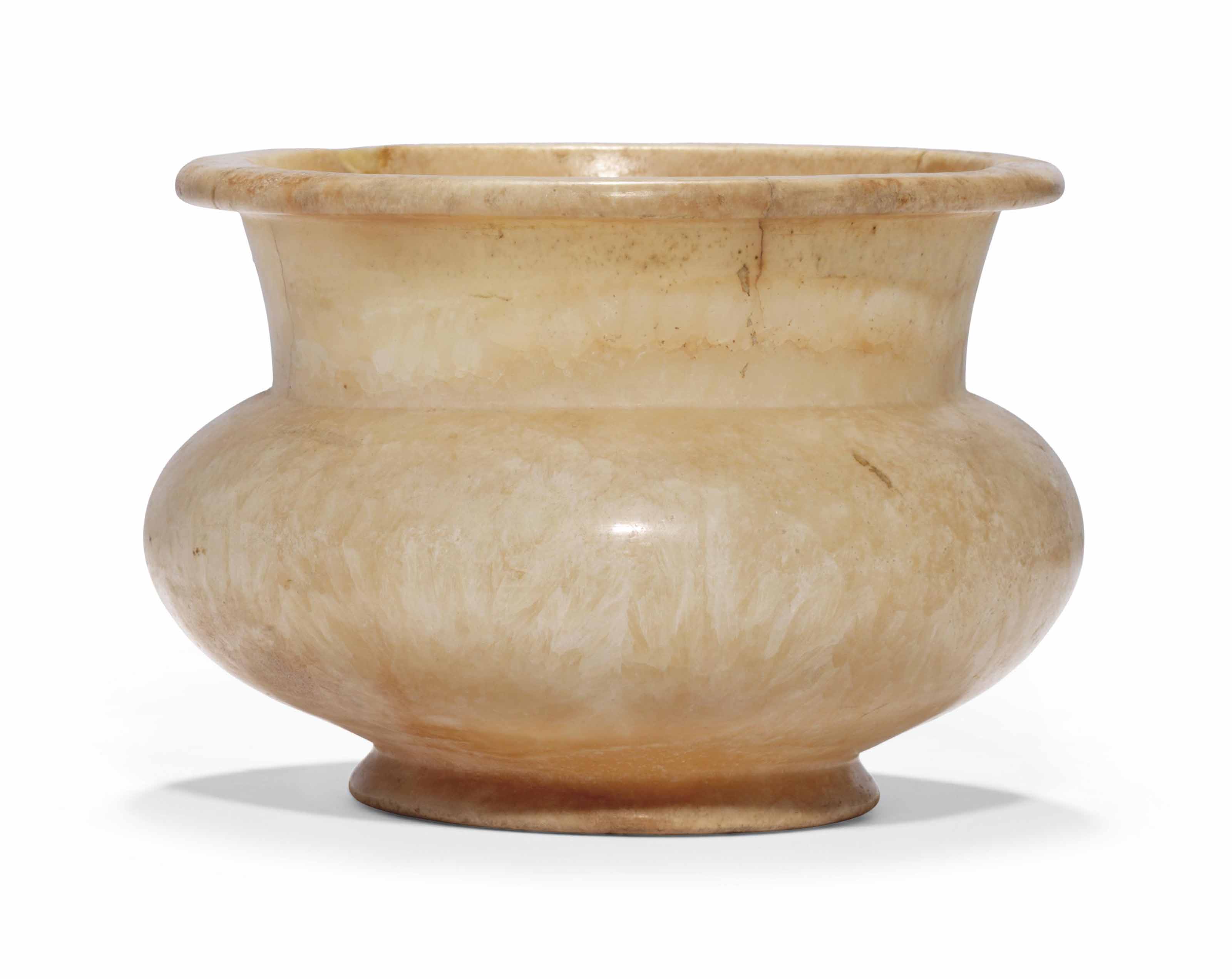 AN EGYPTIAN ALABASTER JAR , NEW KINGDOM, CIRCA 15501069 B.C. Christie's