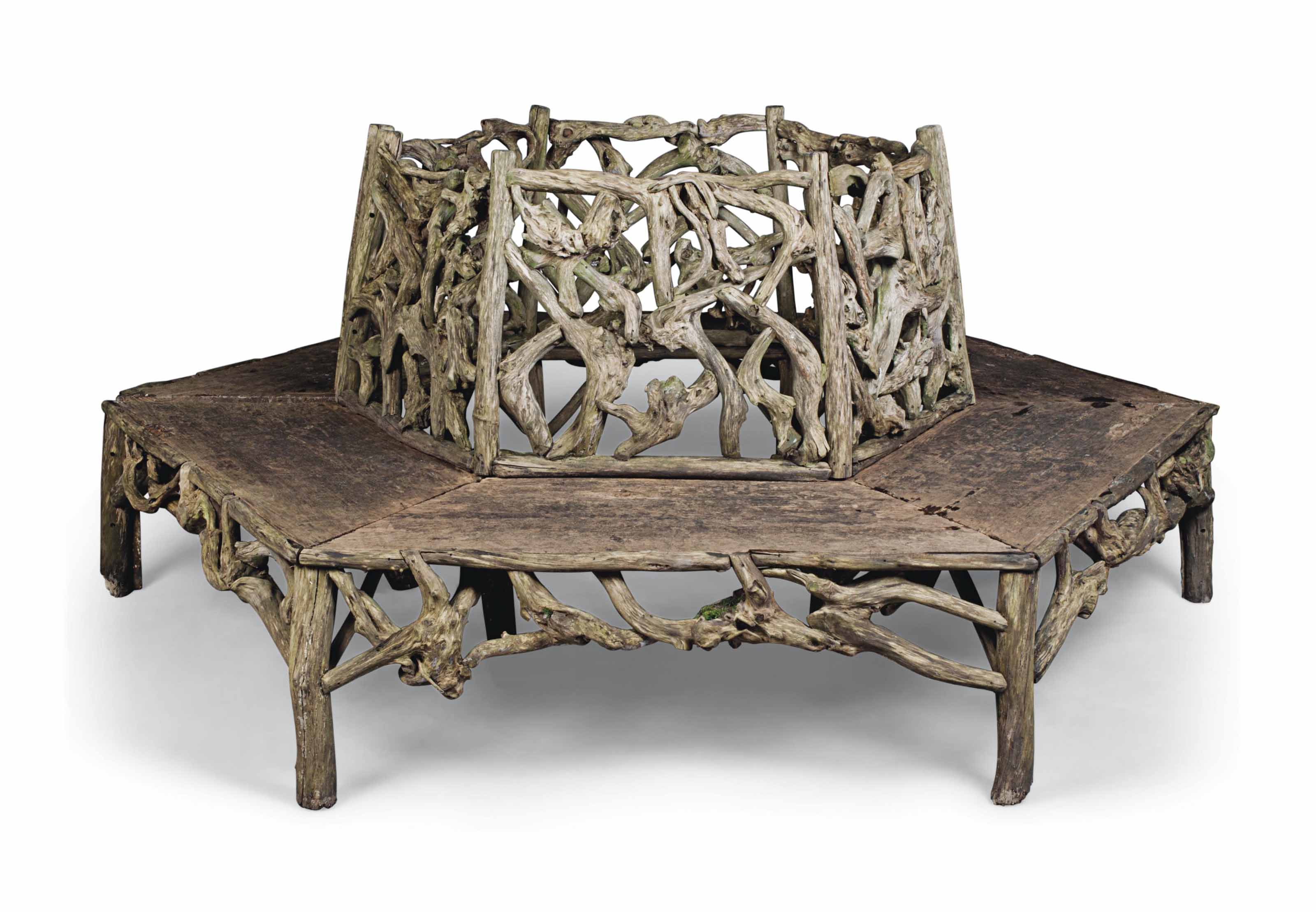 A CIRCULAR GARDEN BENCH , 20TH CENTURY | Christie's