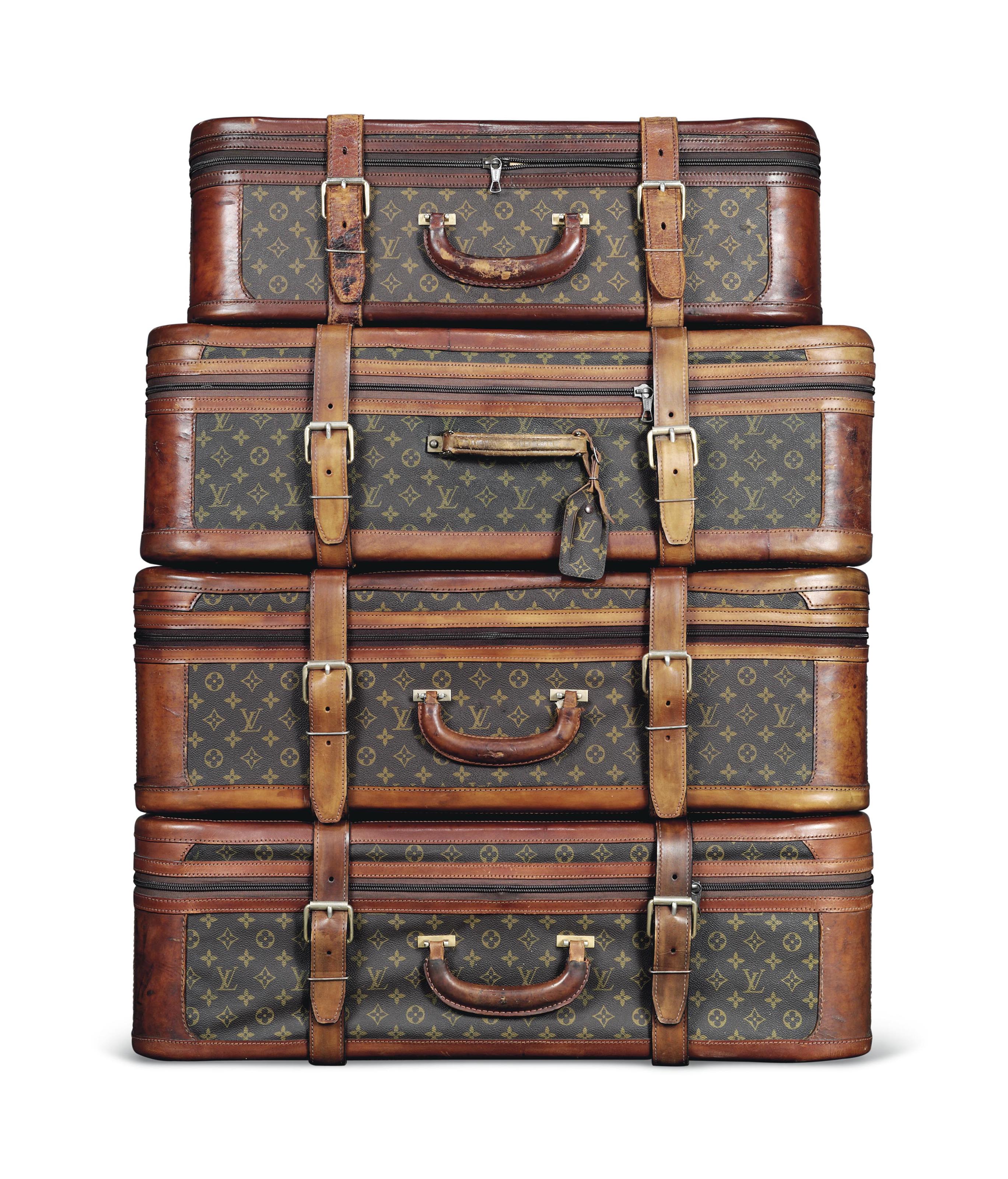 A SET OF FOUR SOFT SIDED SUITCASES IN MONOGRAM CANVAS