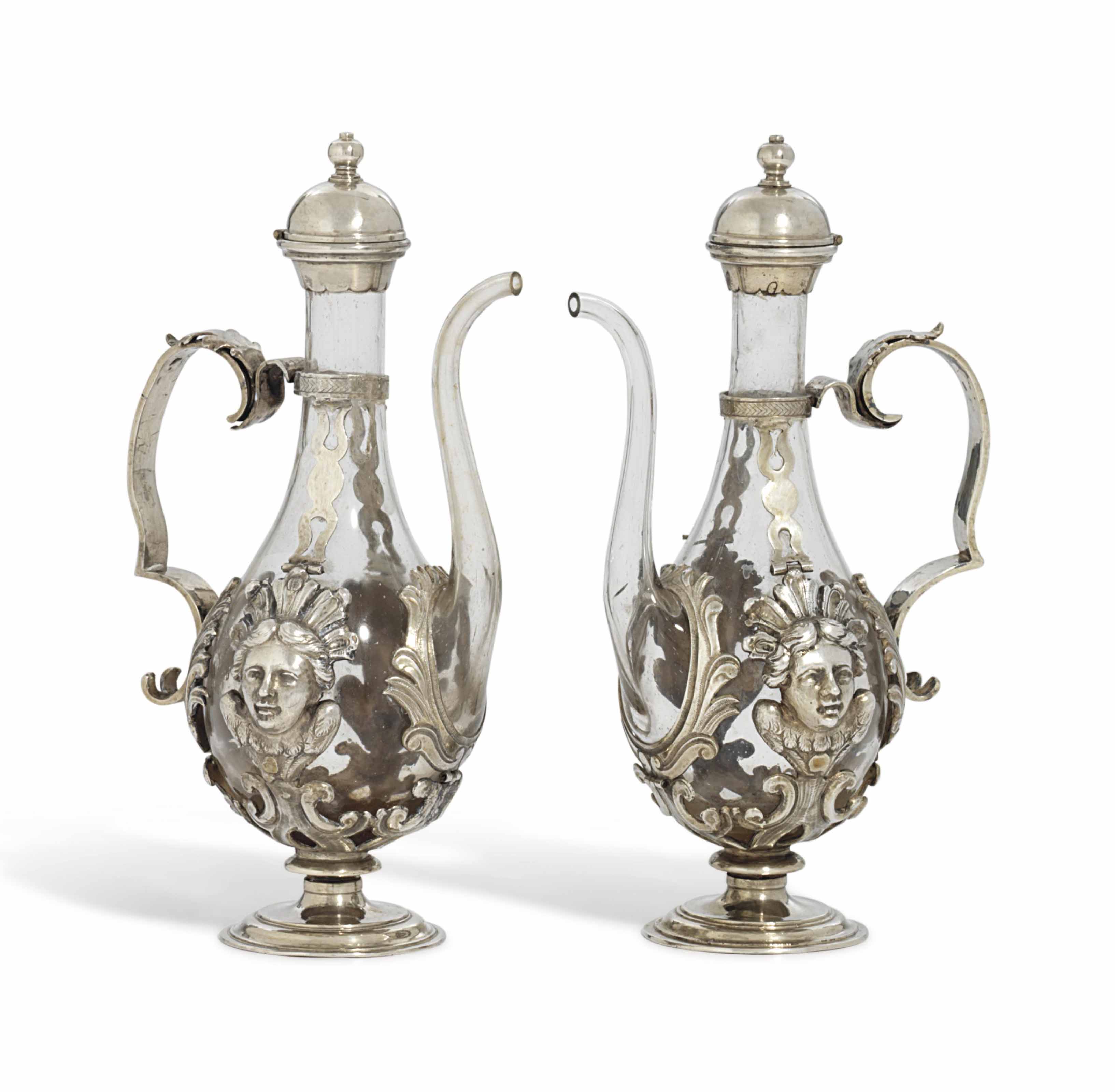 A PAIR OF CONTINENTAL SILVERMOUNTED GLASS CRUETBOTTLES , APPARENTLY