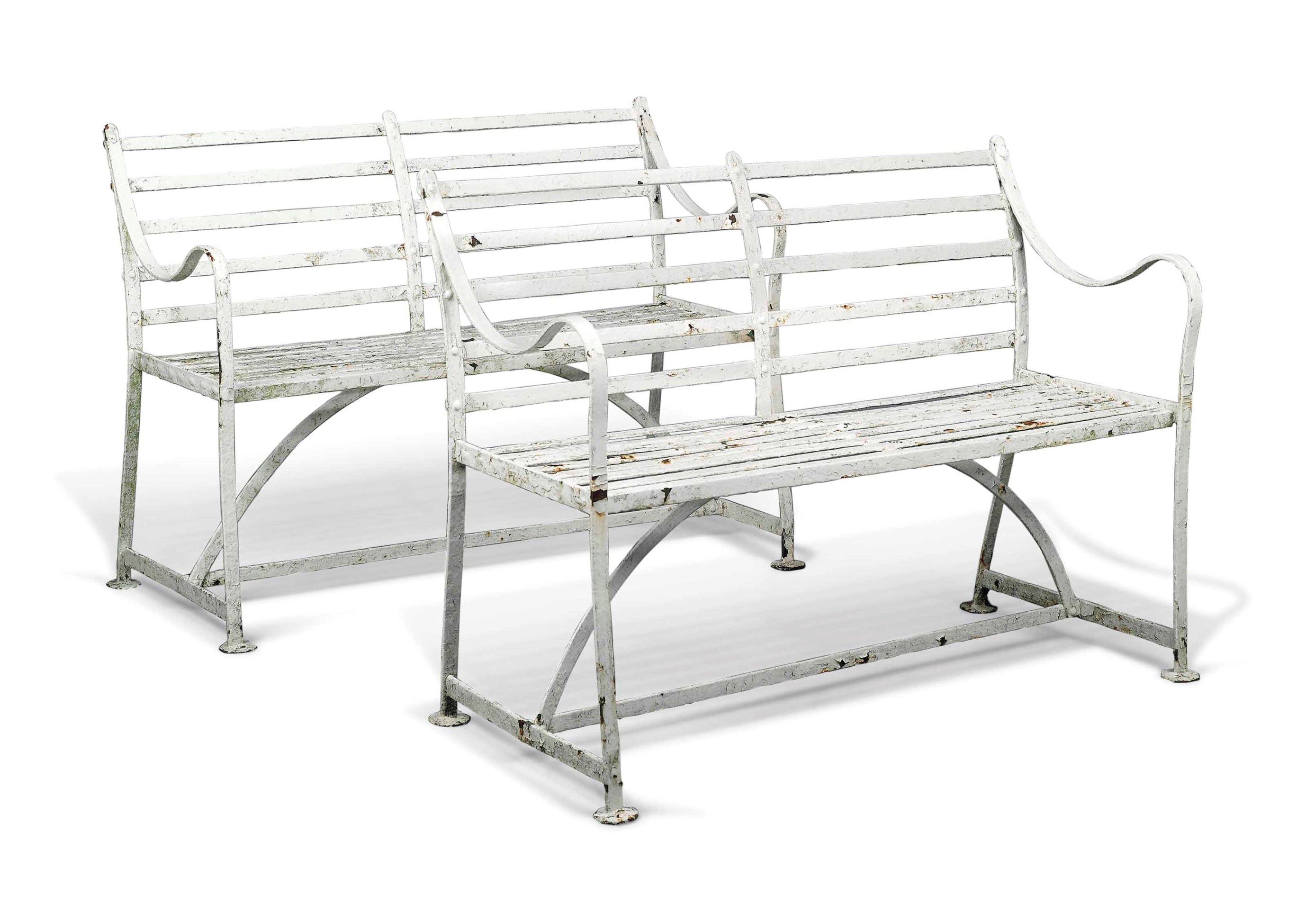 A PAIR OF ENGLISH WROUGHT-IRON GARDEN SEATS