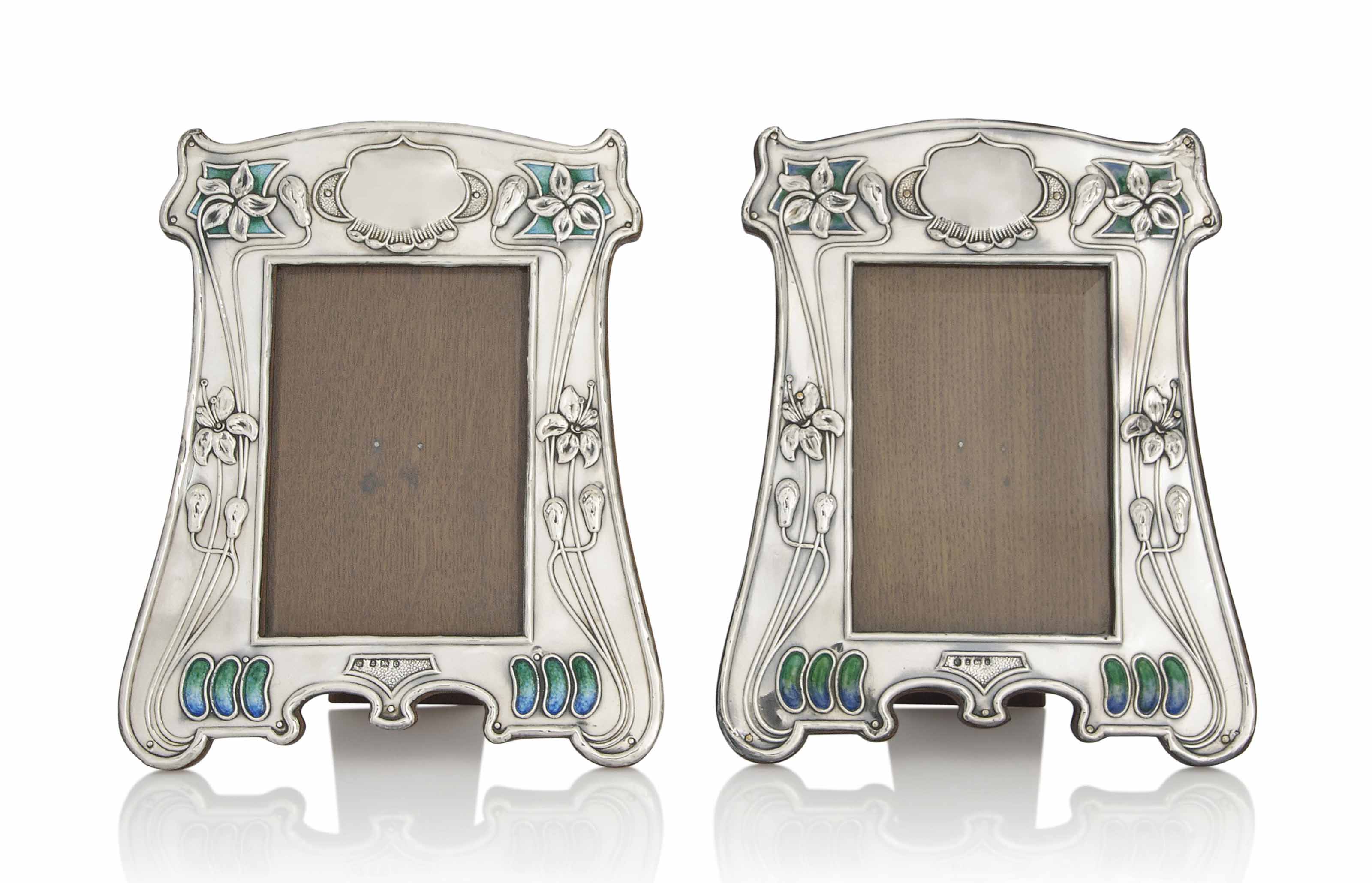A PAIR OF ART NOUVEAU SILVER AND ENAMEL PHOTOGRAPH FRAMES , MARK OF CHARLES S. GREEN & CO. LTD