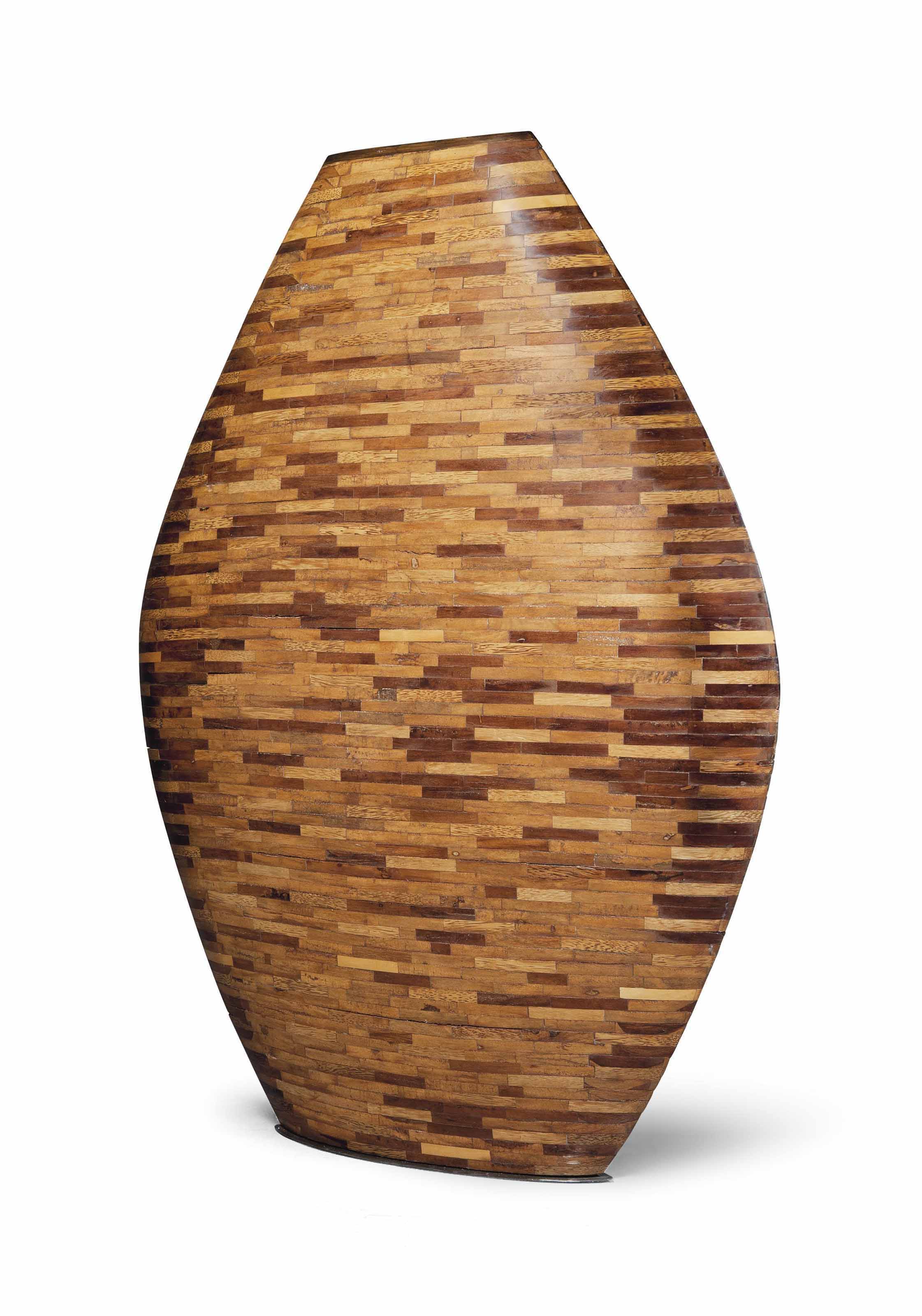 A LARGE ITALIAN HARDWOOD VASE , 1960S/1970S Christie's