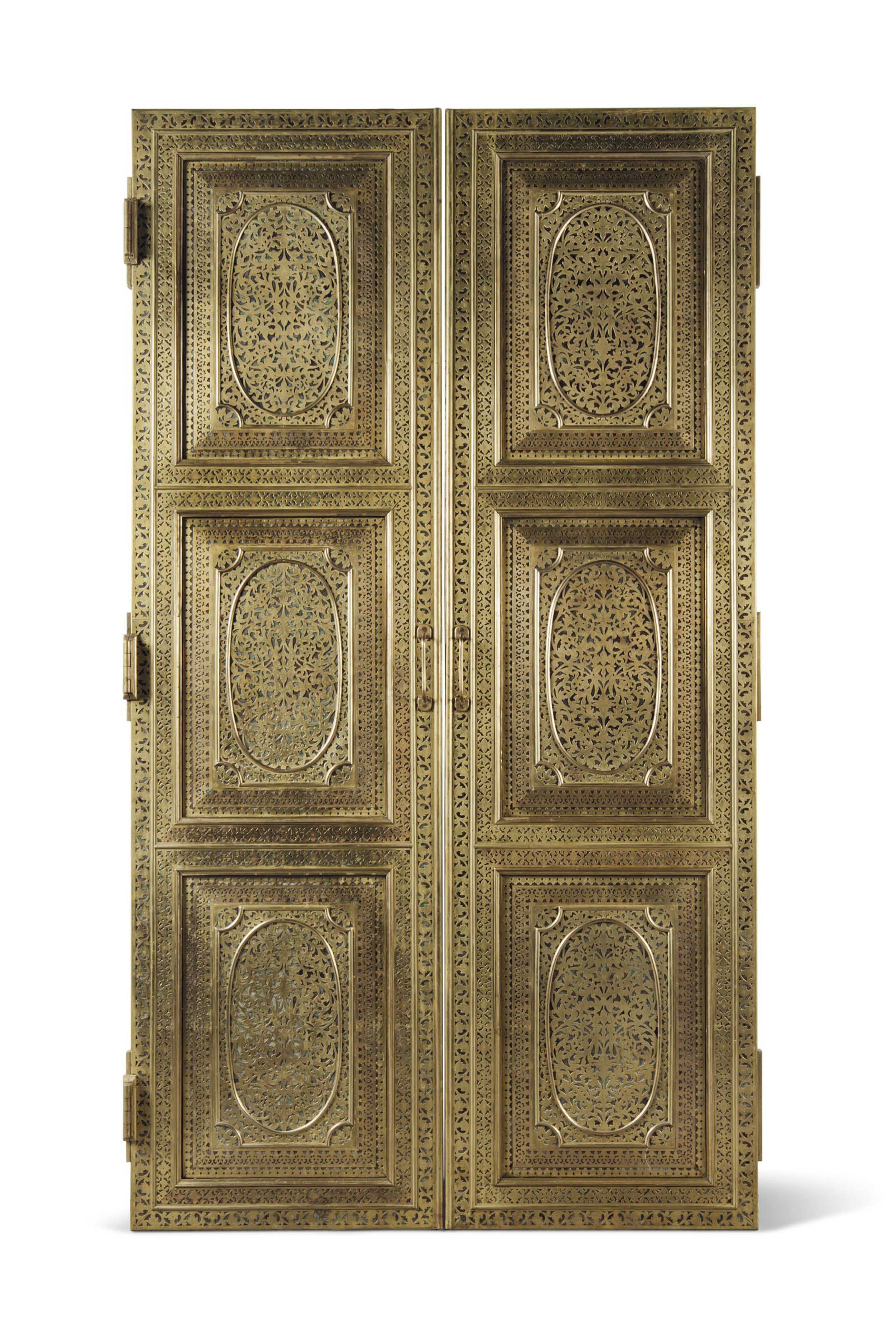 A PAIR OF INDIAN BRASS DOORS , MODERN Christie's