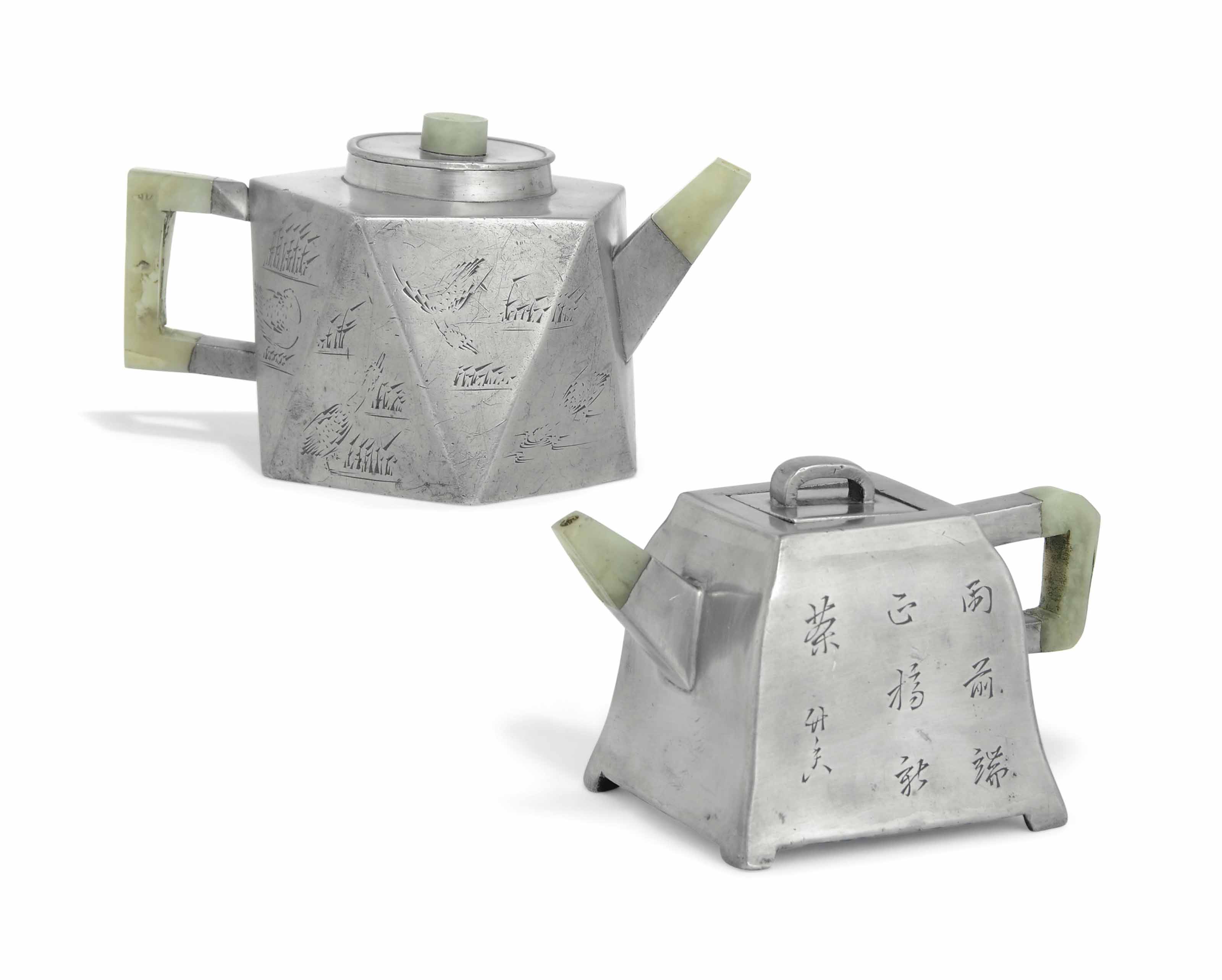 TWO YIXING PEWTERENCASED TEAPOTS AND COVERS