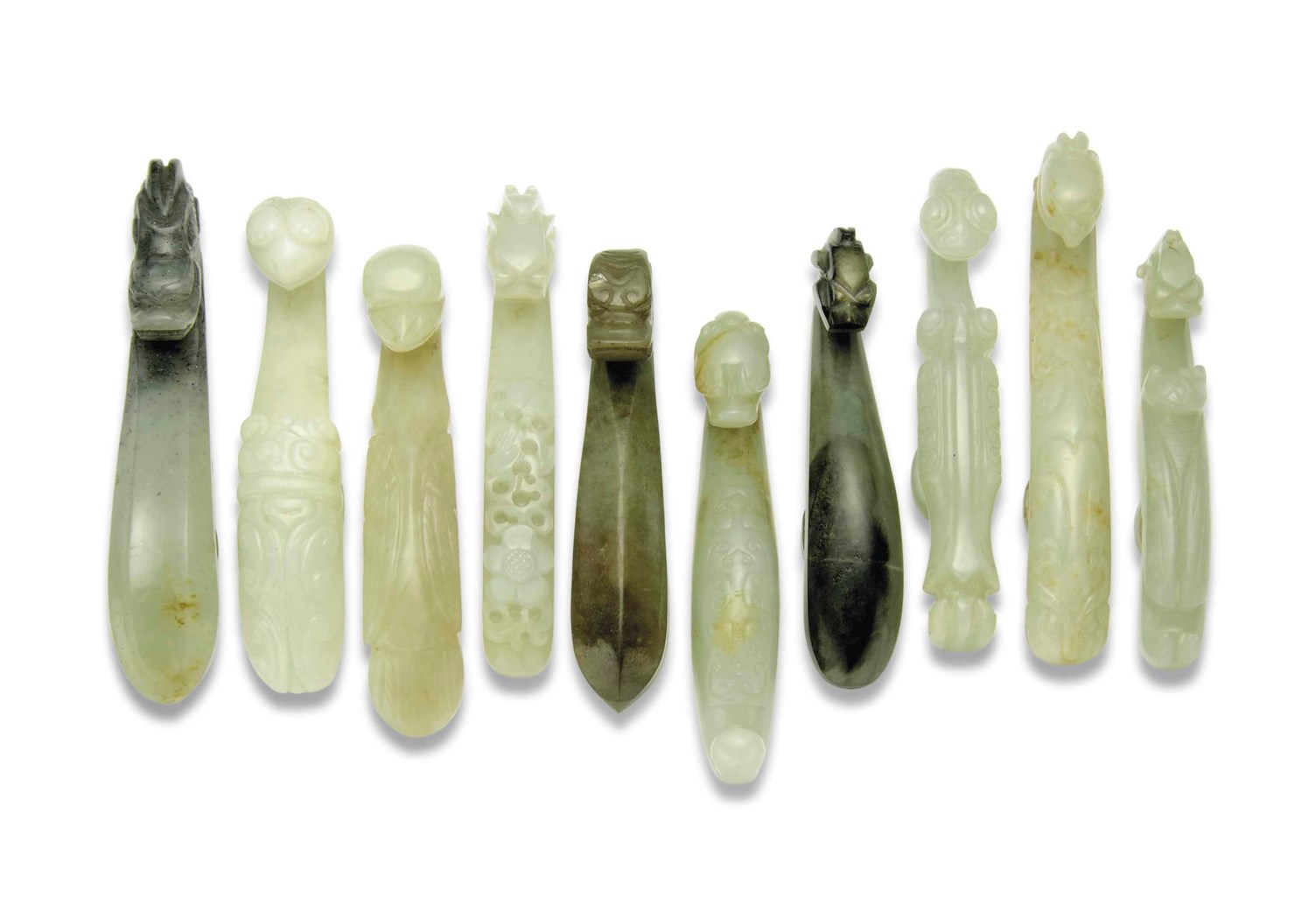 A COLLECTION OF TEN JADE BELT HOOKS