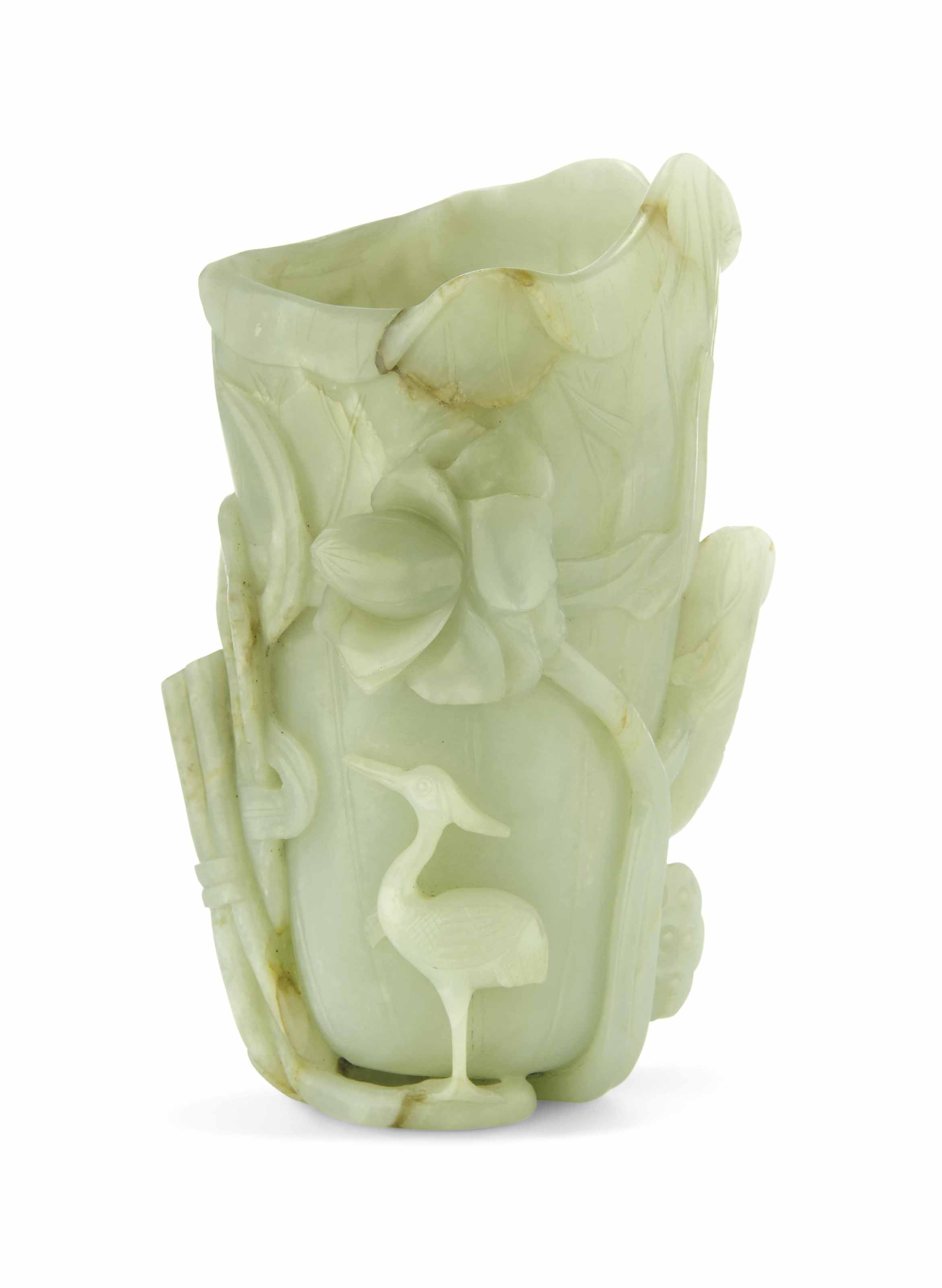 A PALE CELADON JADE 'LOTUS AND CRANE' VASE