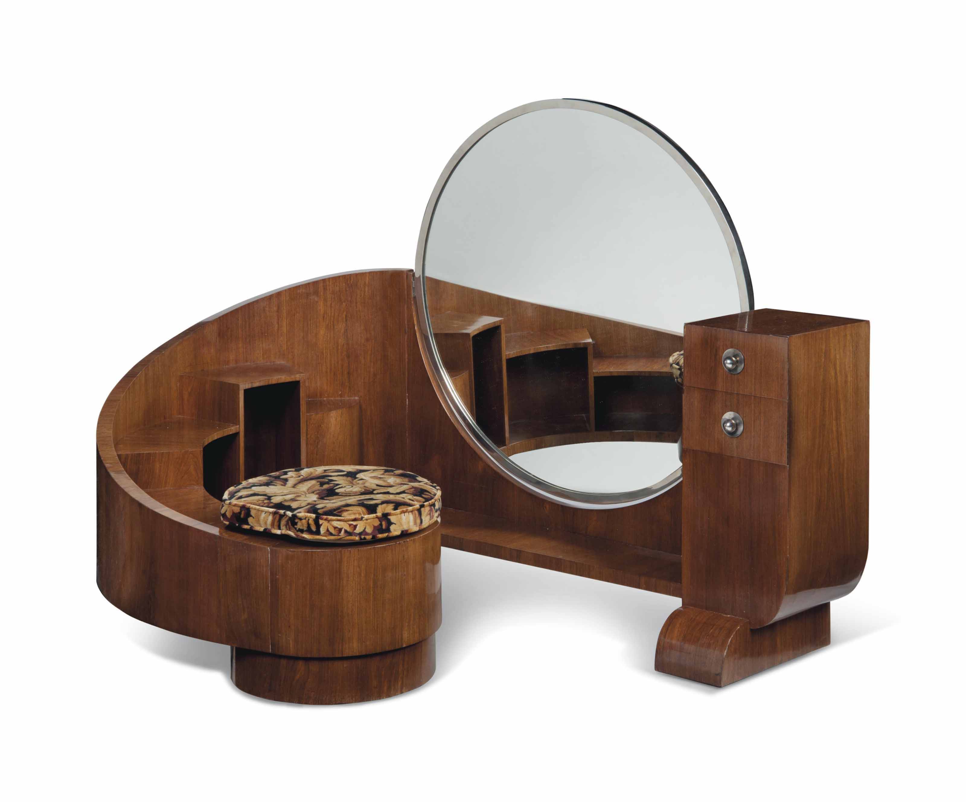 A FRENCH ART DECO BRAZILIAN ROSEWOOD CURVED DRESSING TABLE