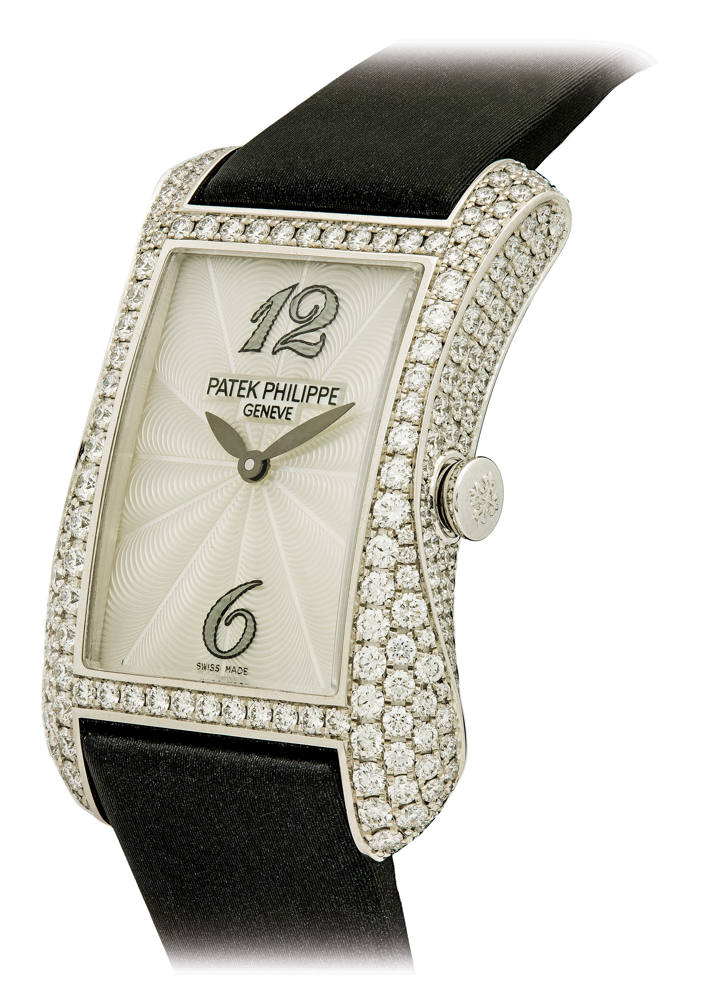 PATEK PHILIPPE. A LADY'S FINE 18K WHITE GOLD AND DIAMONDSET CURVED