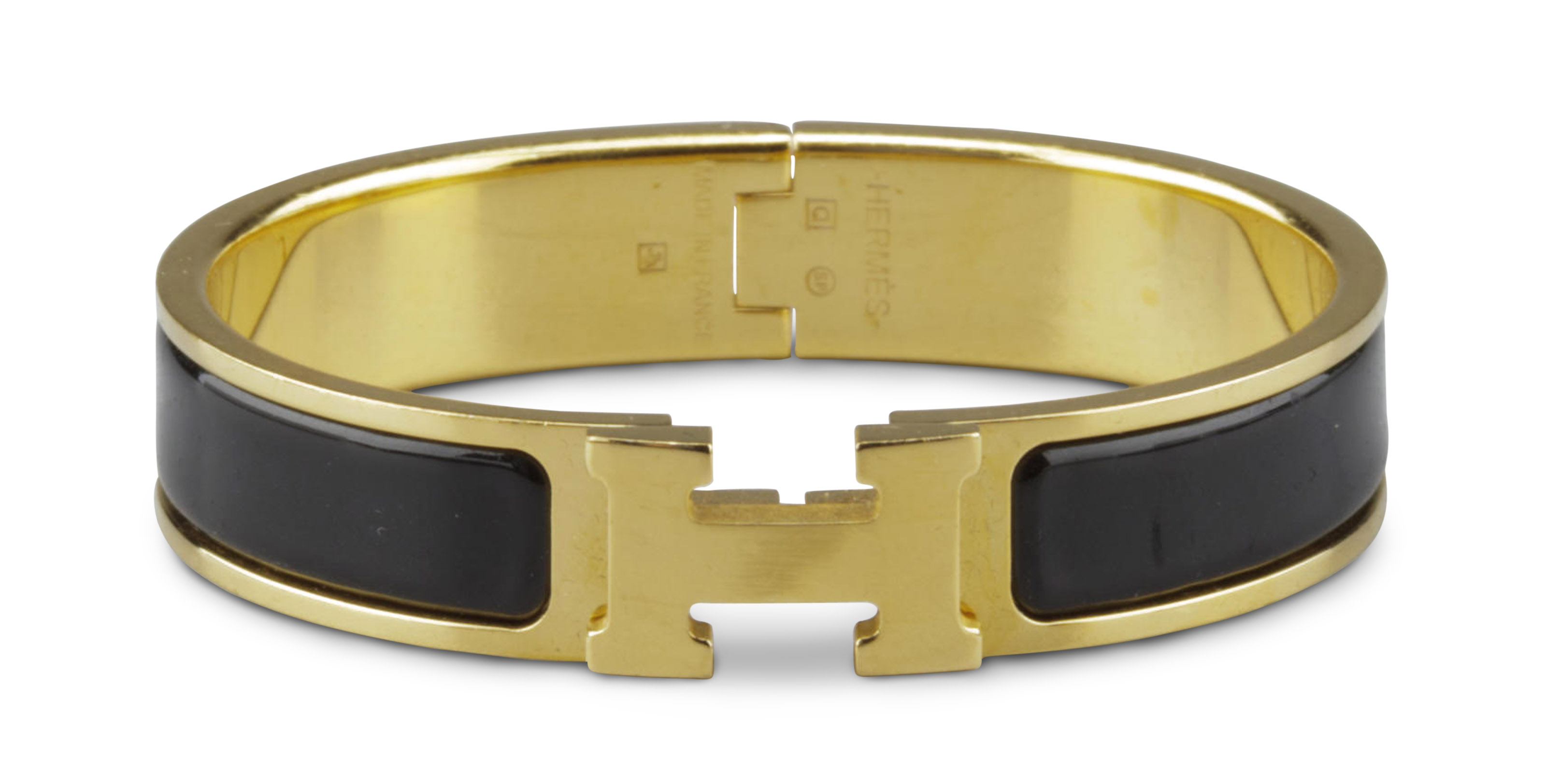 A BLACK ENAMEL CLIC-CLAC H BRACELET, HERMÈS, 2013 | Christie's