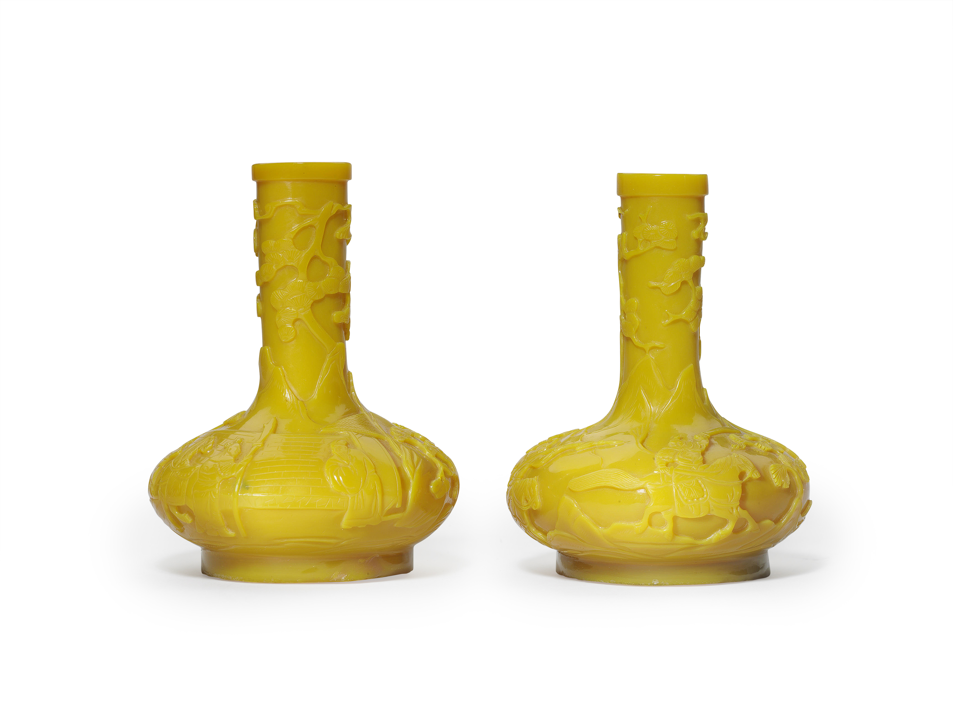 A PAIR OF SMALL CARVED SEMIOPAQUE EGG YOLKYELLOW GLASS BOTTLE VASES
