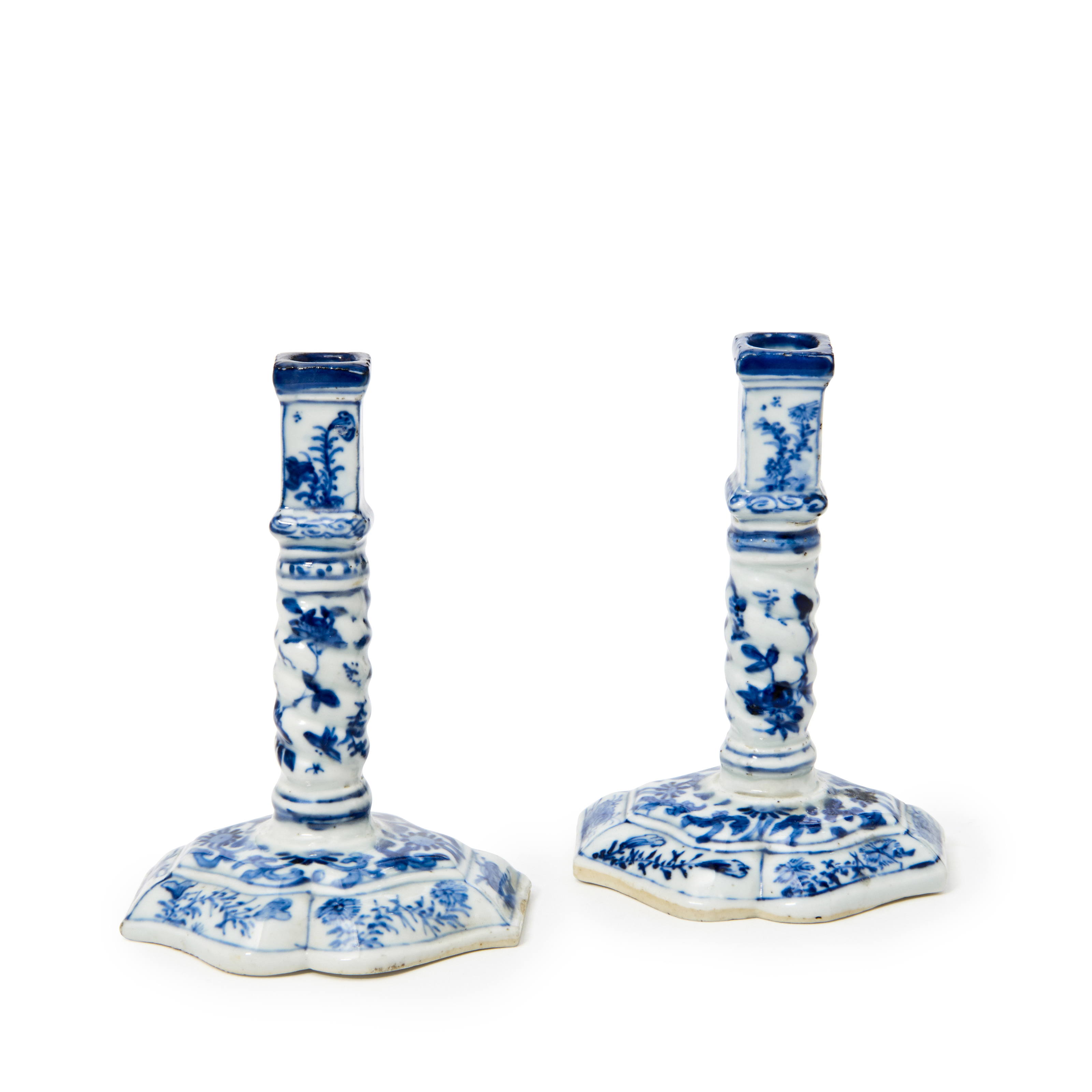 A PAIR OF BLUE AND WHITE MOULDED CANDLESTICKS, KANGXI PERIOD (16621722
