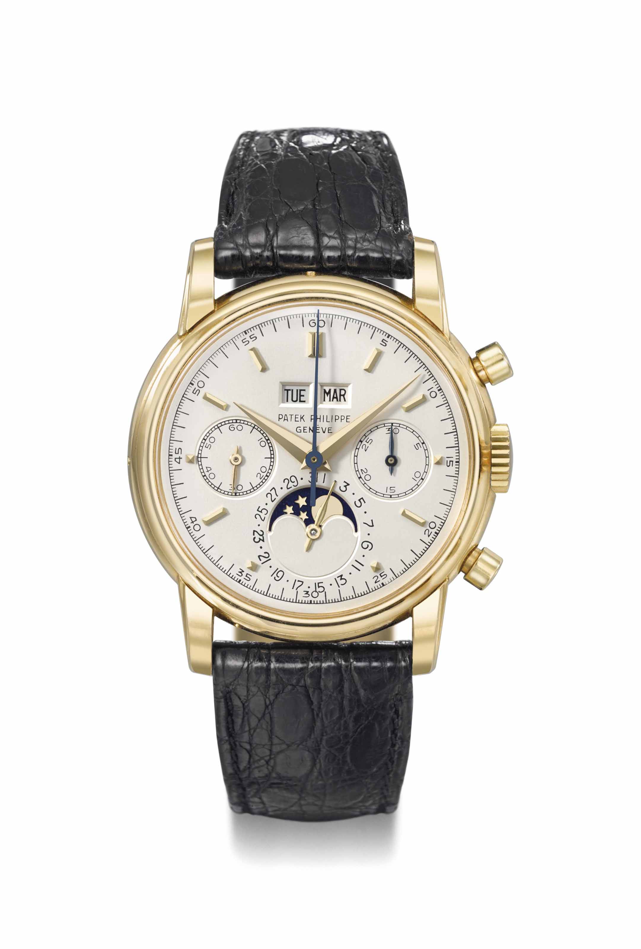 Patek Philippe. A fine and rare 18K gold world time wristwatch