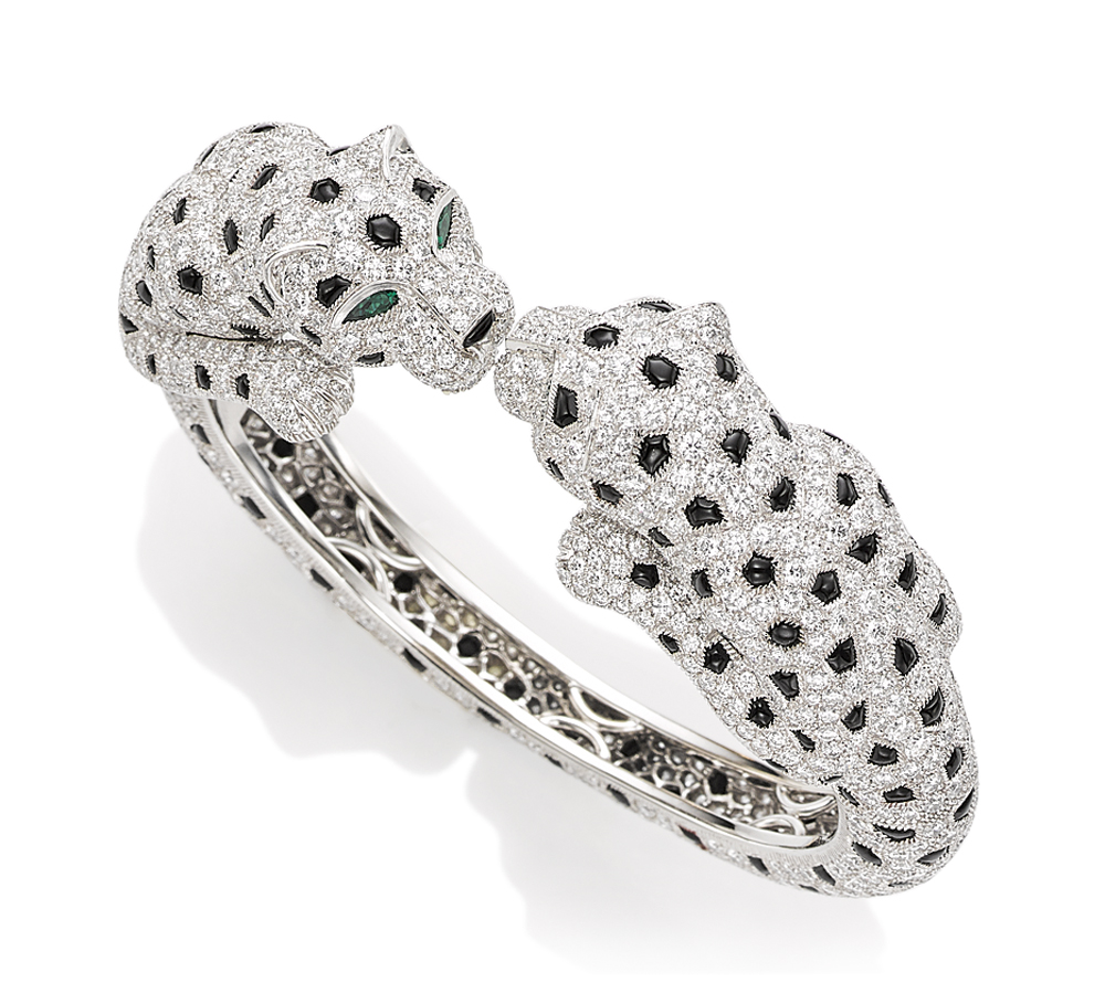A DIAMOND AND ONYX DOUBLE PANTHER BANGLE BY CARTIER Christie s