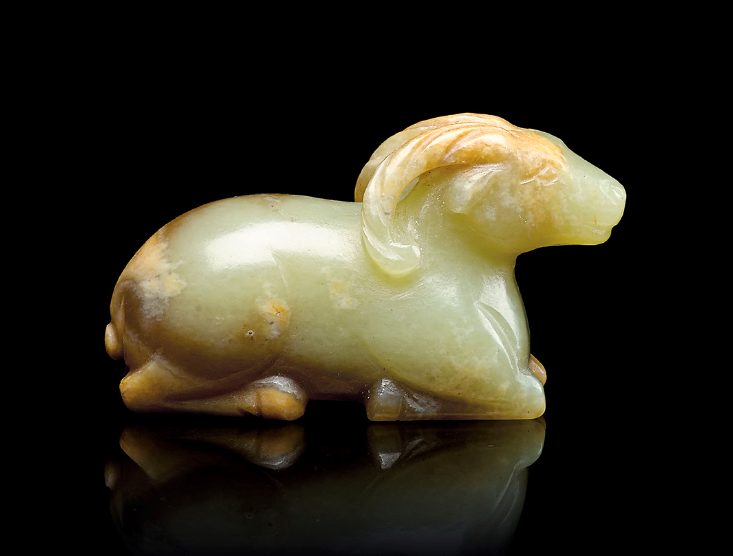 A SMALL YELLOW JADE CARVING OF A RAM, SONGMING DYNASTY (9601644