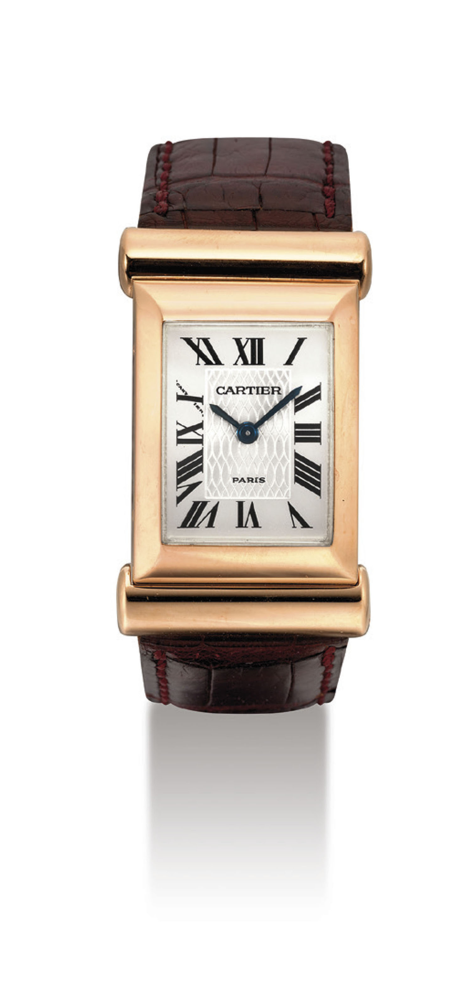 CARTIER. A FINE AND RARE 18K GOLD LIMITED EDITION RECTANGULAR DRIVER'S