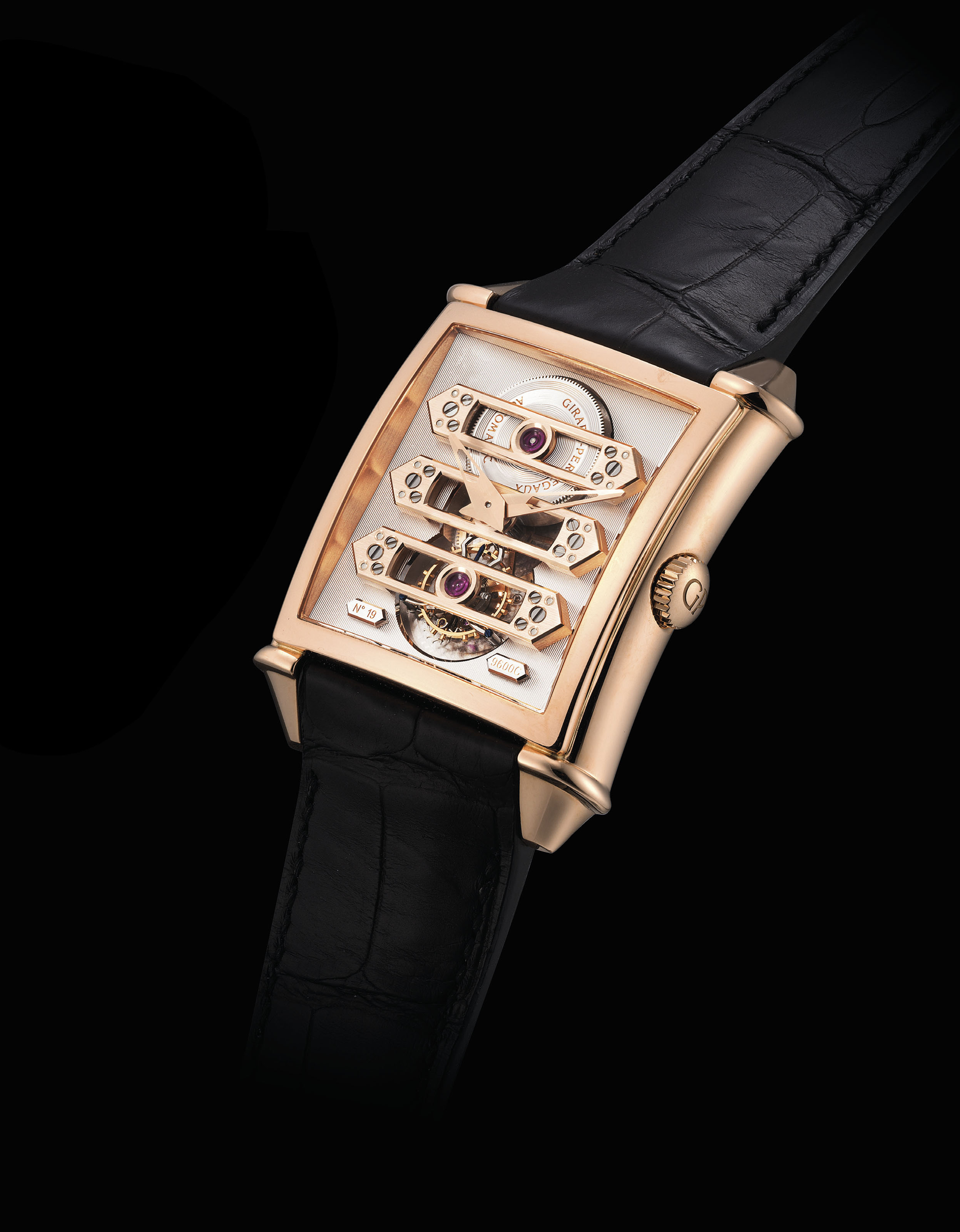GirardPerregaux. A very rare and unusual 18K gold double dialed triple