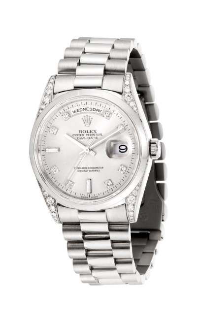 rolex day date platinum on wrist