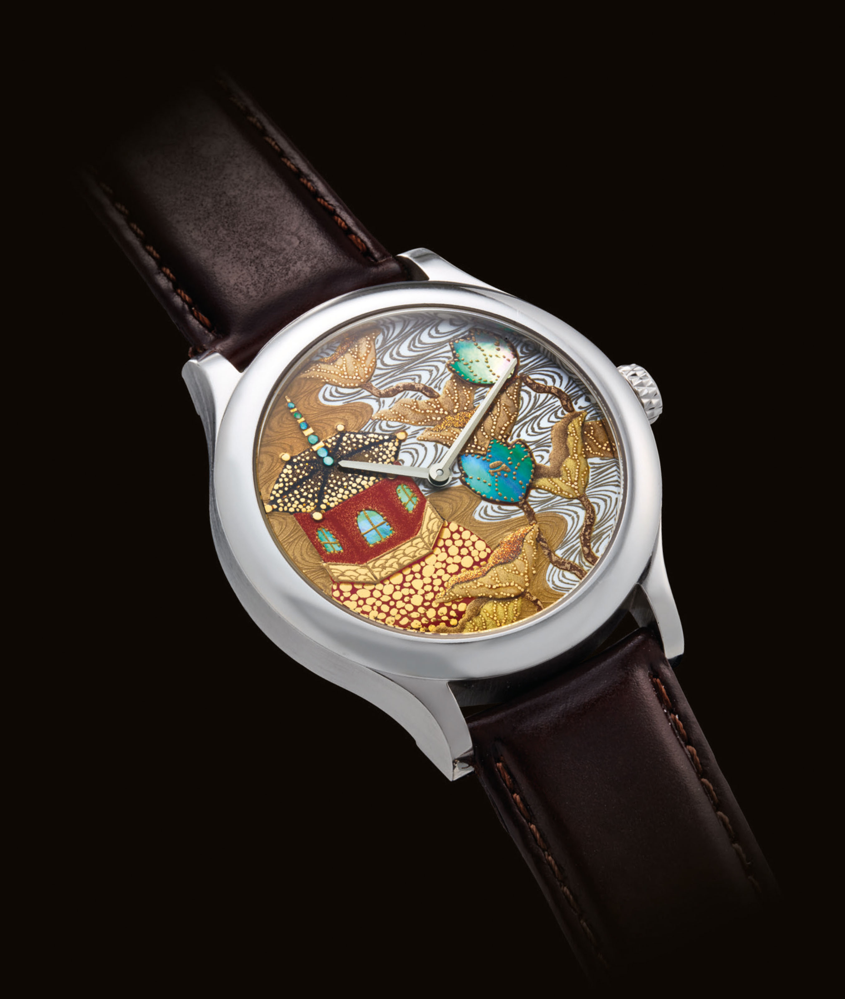 VAN CLEEF & ARPELS. A FINE AND EXTREMELY RARE 18K WHITE GOLD AND MOTHEROFPEARL LIMITED EDITION
