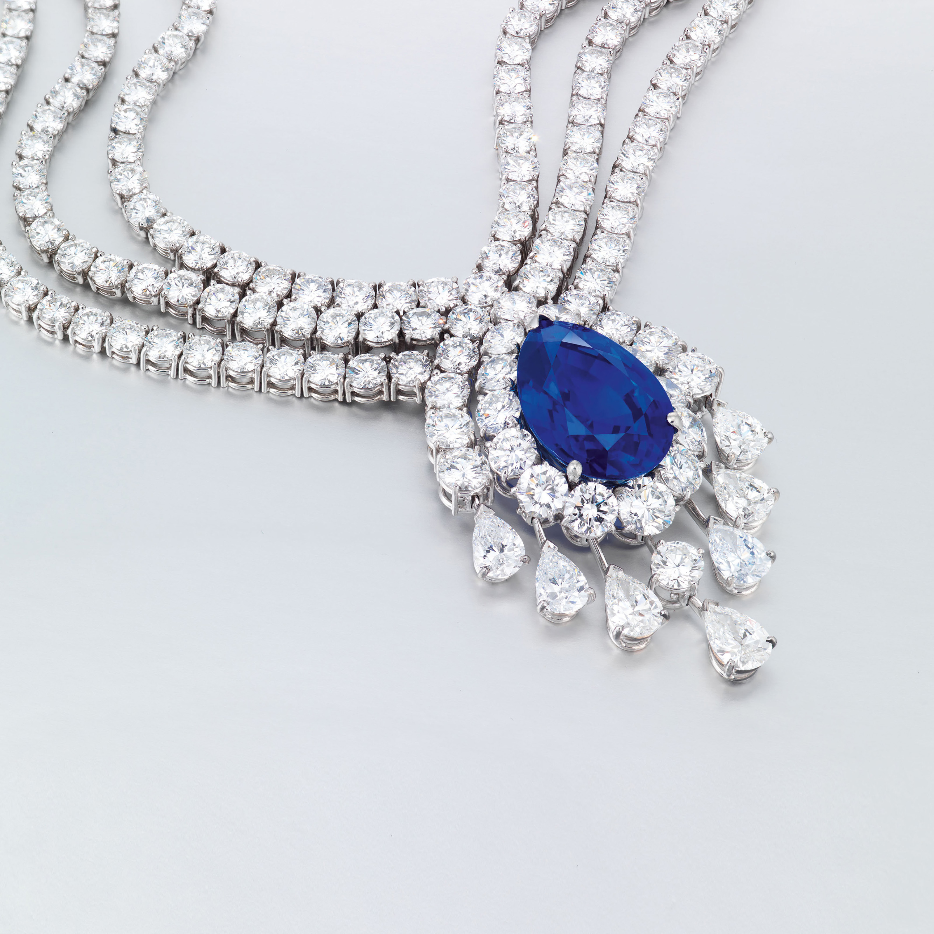 A SAPPHIRE AND DIAMOND PENDANT NECKLACE, BY VAN CLEEF & ARPELS
