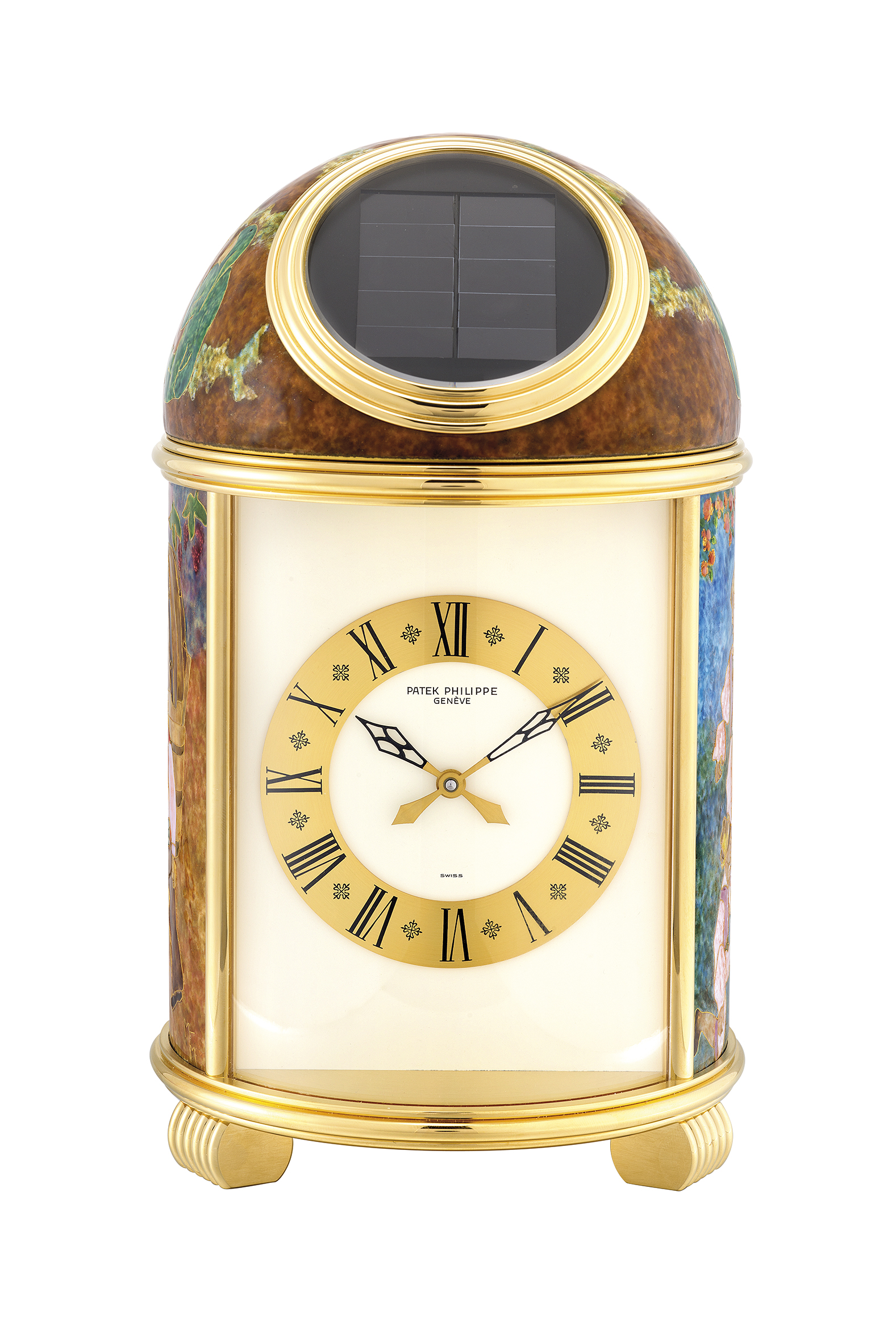 PATEK PHILIPPE. A UNIQUE AND EXTREMELY FINE GILT BRASS SOLAR POWERED