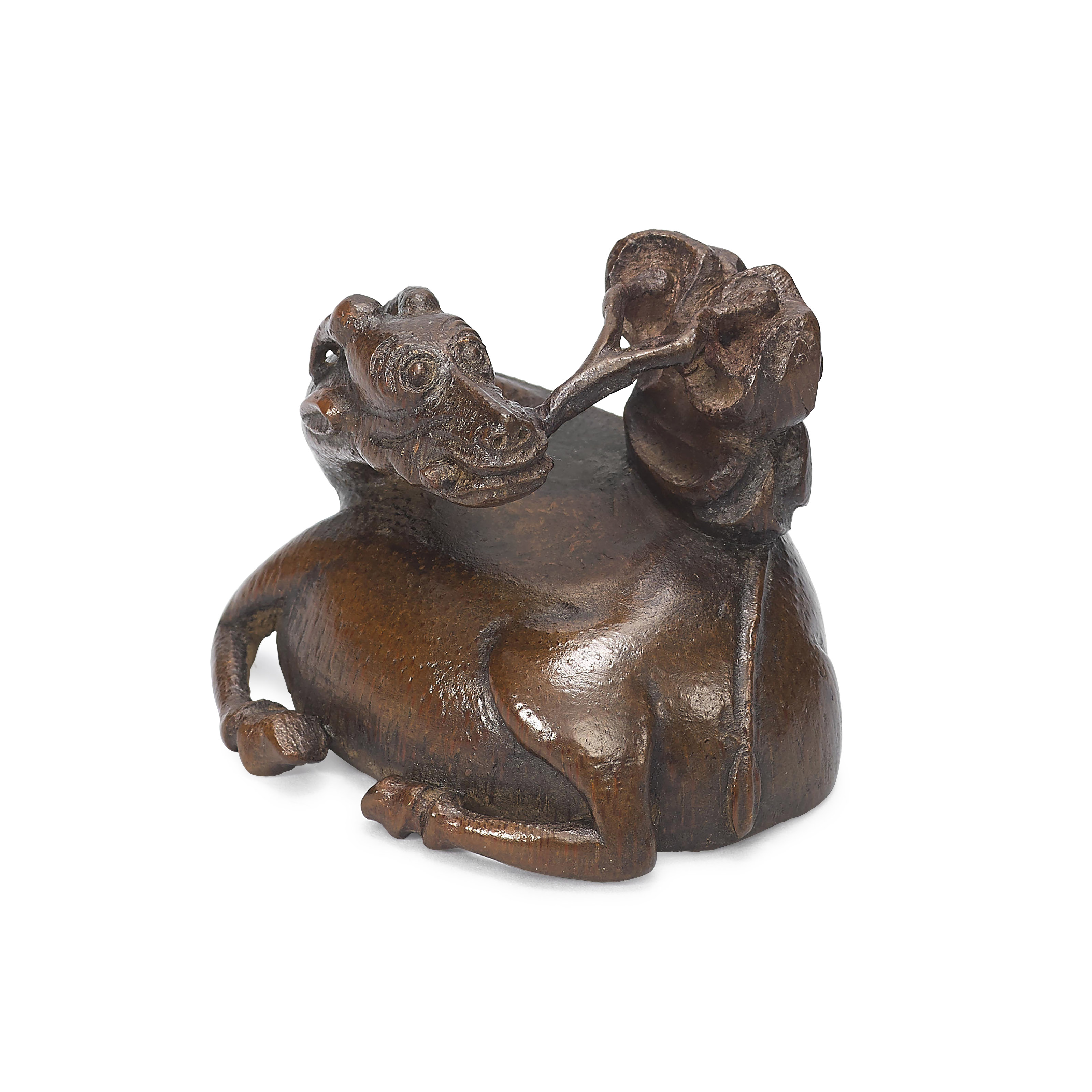 A SMALL CARVED BAMBOO DEERFORM CUP, QING DYNASTY (16441911) Christie’s