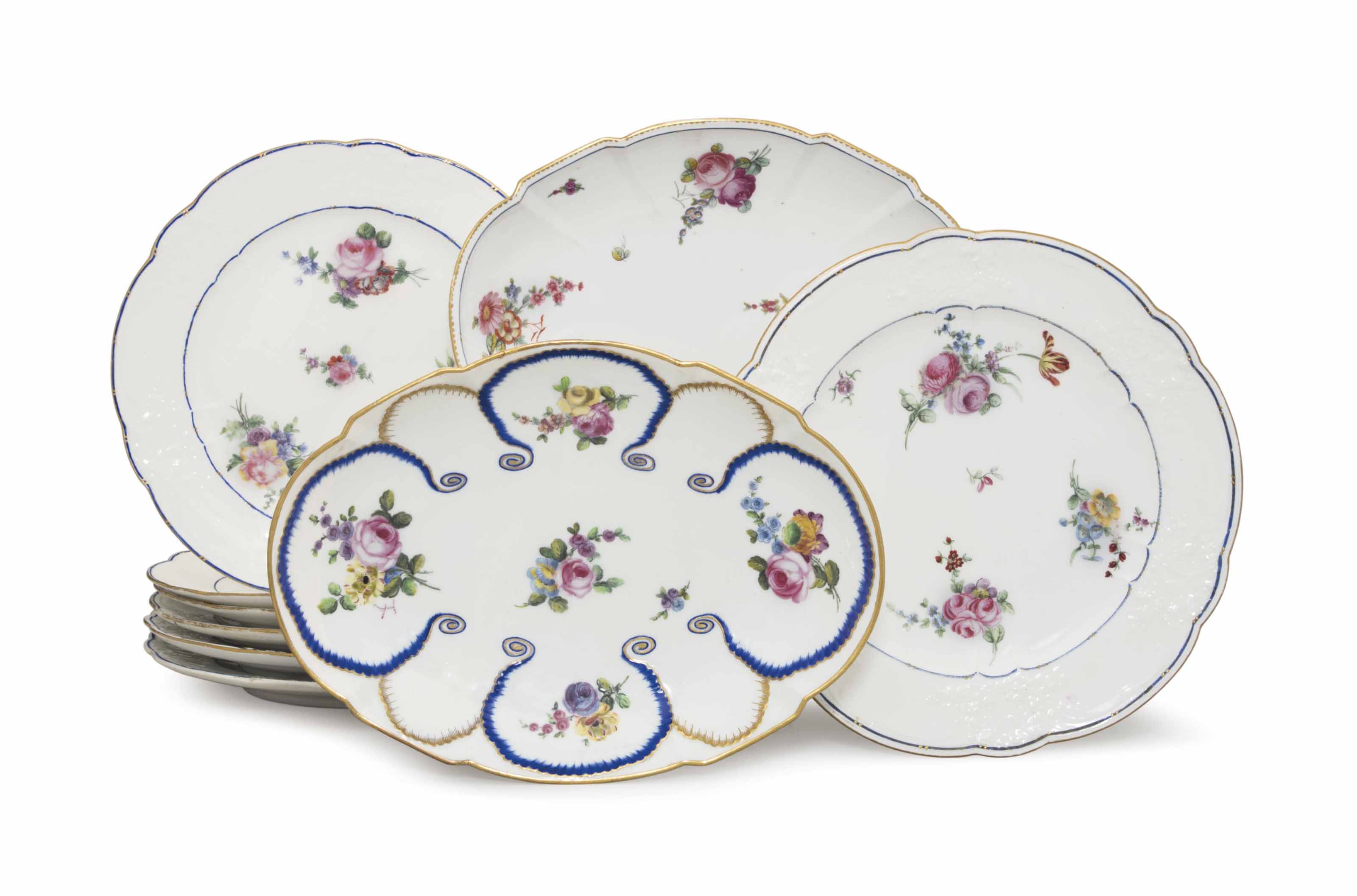 SEVEN SEVRES PORCELAIN PLATES AND TWO SEVRES PORCELAIN OVAL DISHES
