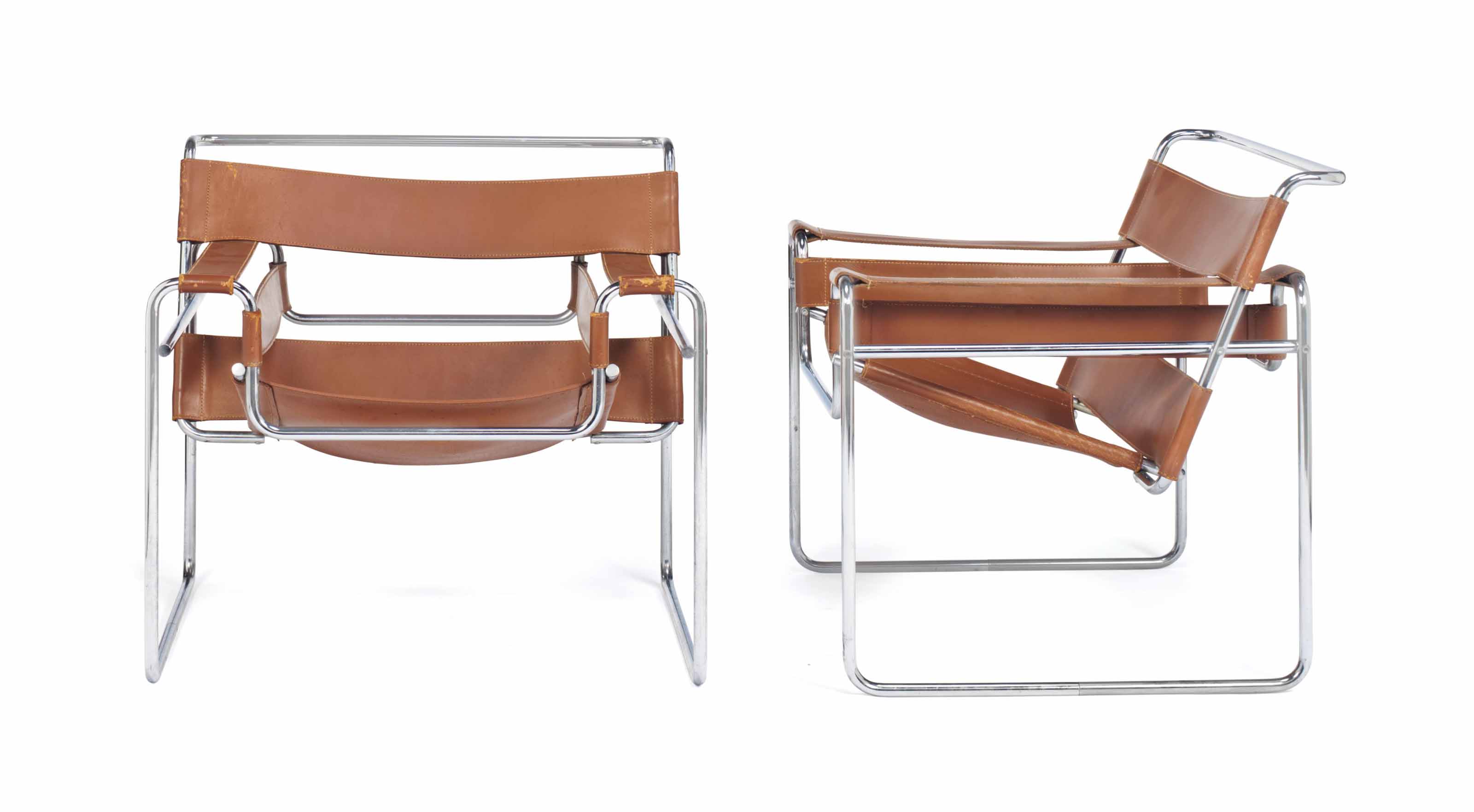 A Pair Of Chromed Steel And Brown Leather Wassily Armchairs By