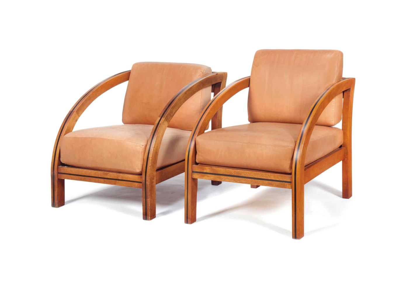 TWO SIMILAR AMERICAN MAPLE AND LEATHER ARMCHAIRS