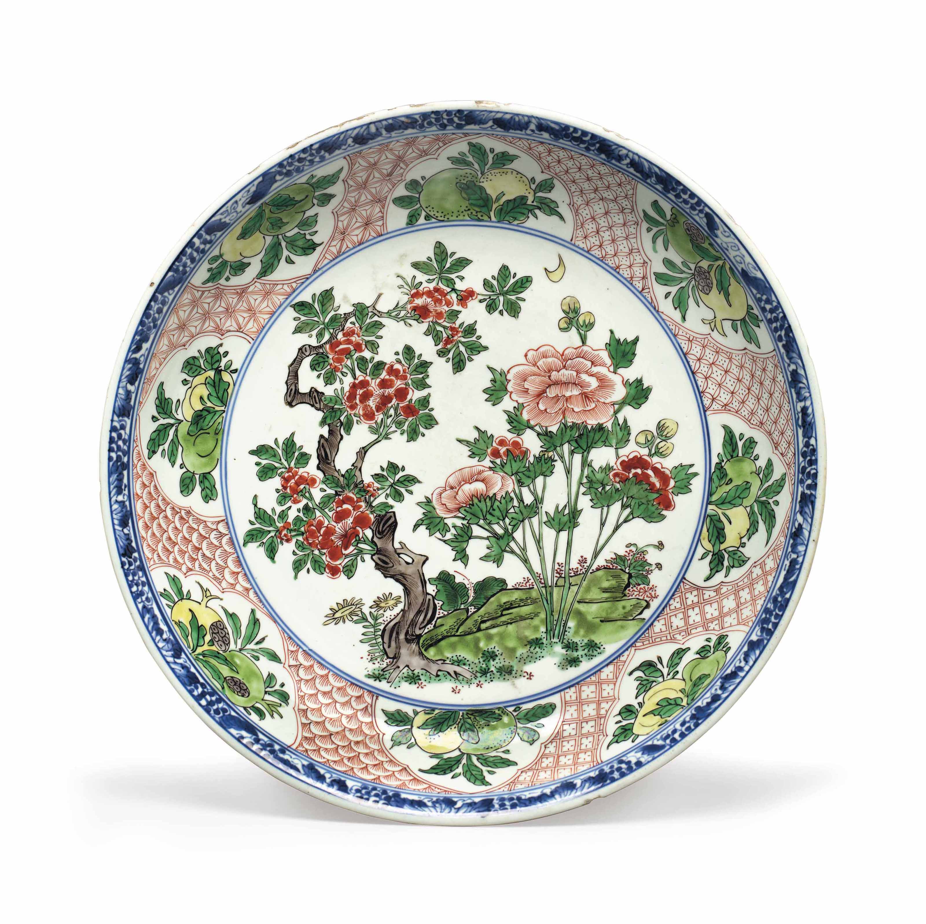 AN UNUSUAL WUCAI SAUCER DISH , 17TH CENTURY Christie's