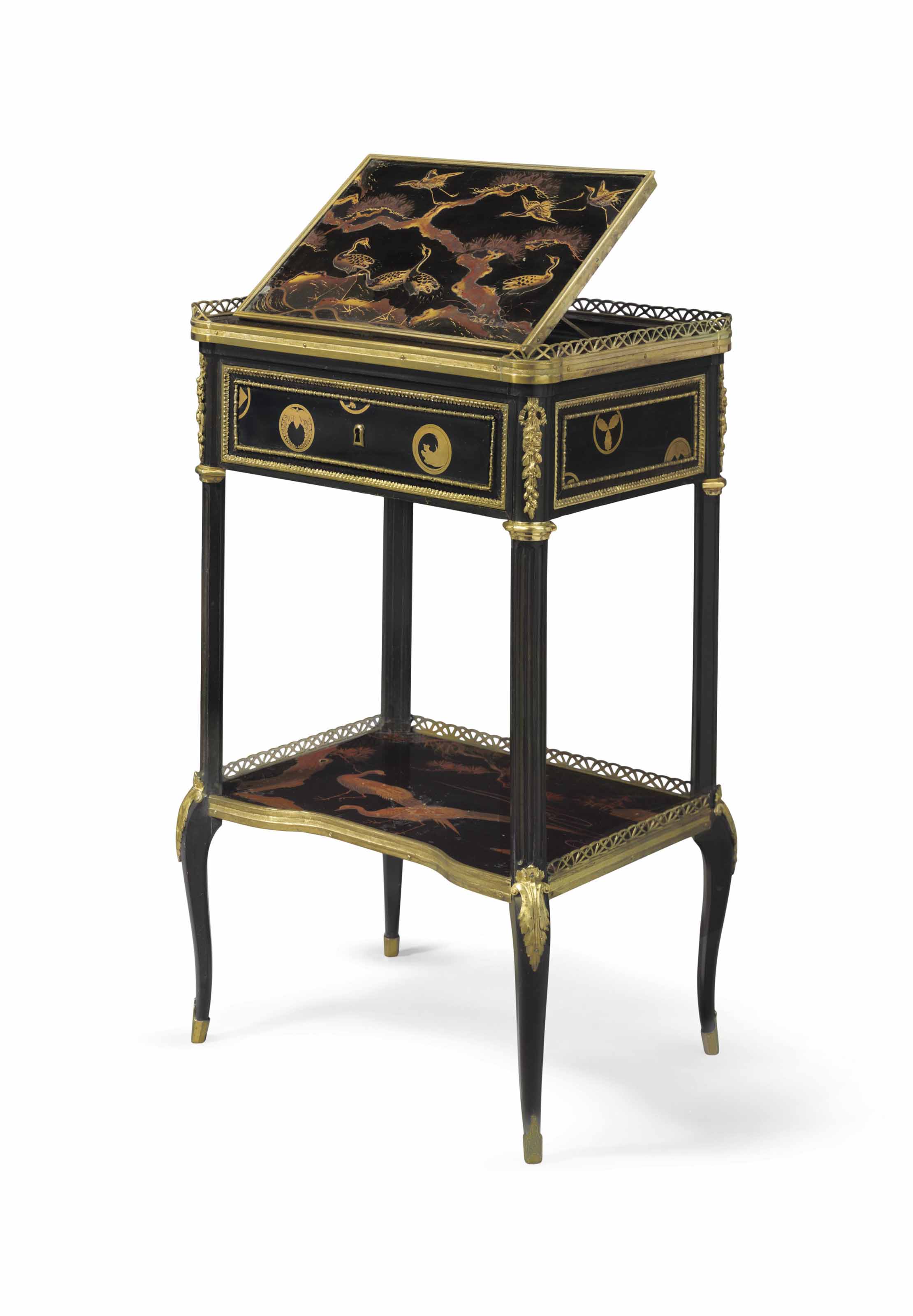 A Louis XVI ormolu-mounted ebony and Japanese lacquer table &agrave; pupitre, attributed to Martin Carlin, circa 1775-1780. 30&frac12;  in (74  cm) high, 18  in (45.5  cm) wide, 13&frac12;  in (34.5  cm) deep. Sold for $161,000 on 13 April 2016 at Christie&rsquo;s in New York