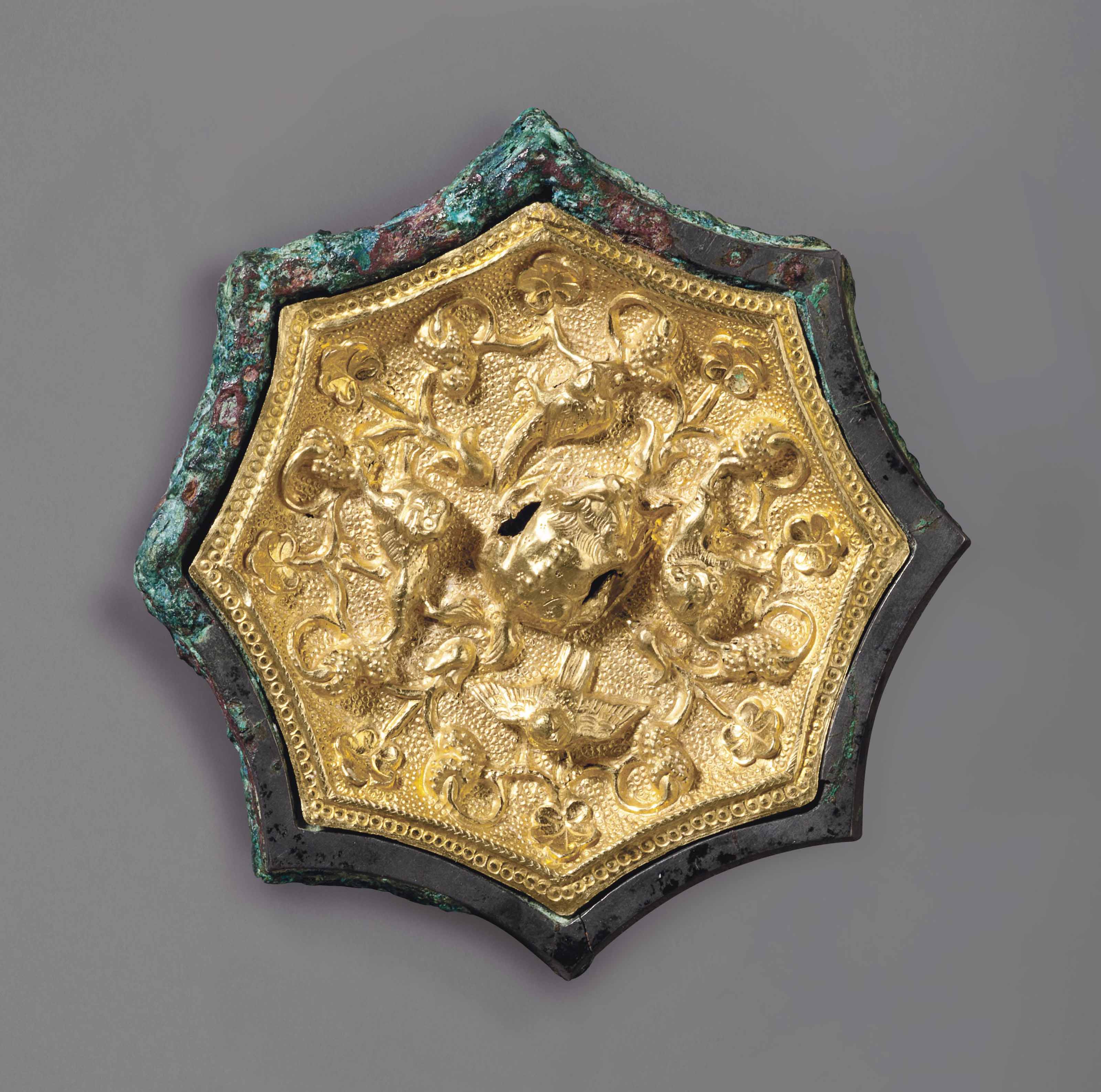 A MINIATURE GOLD SHEETINLAID BRONZE OCTAFOIL MIRROR , CHINA, TANG