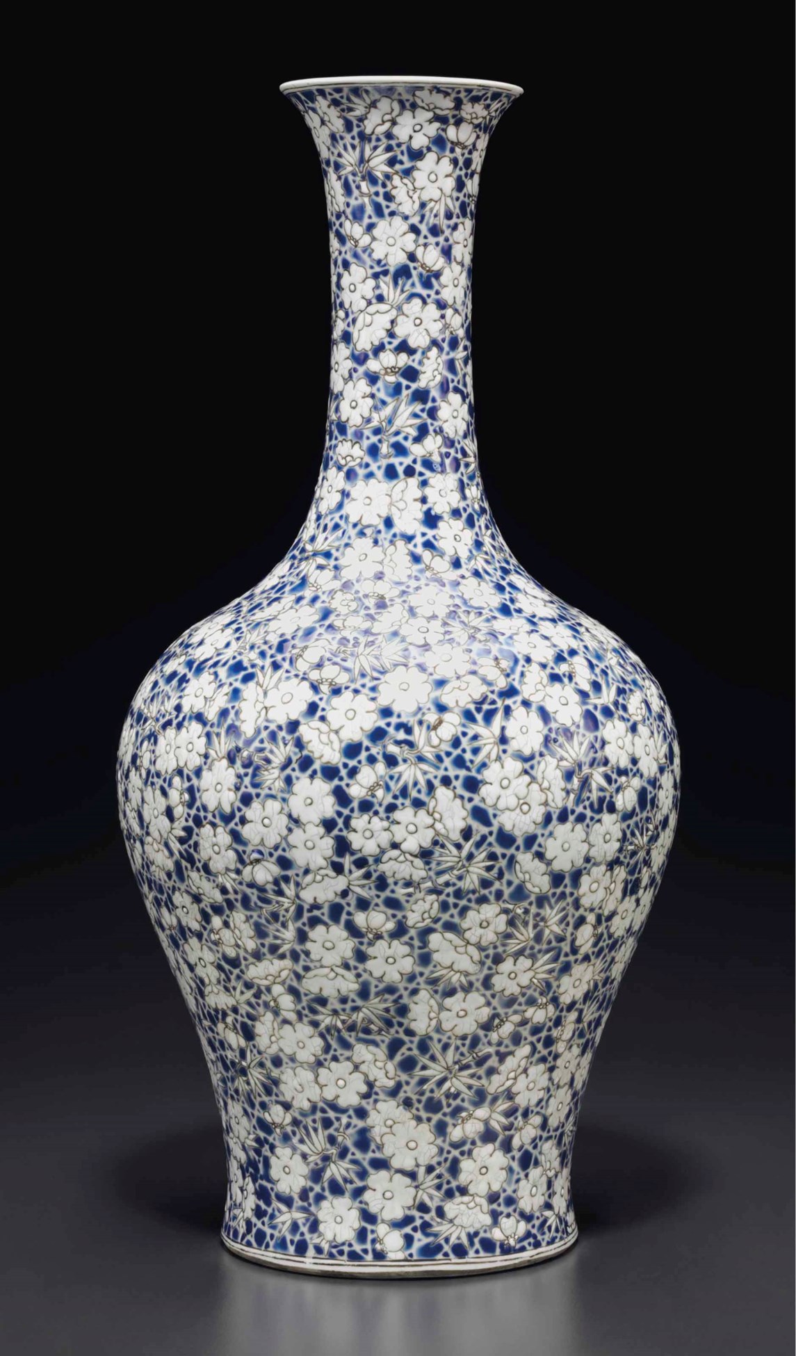 AN UNUSUAL BLUE AND WHITEENAMELED VASE