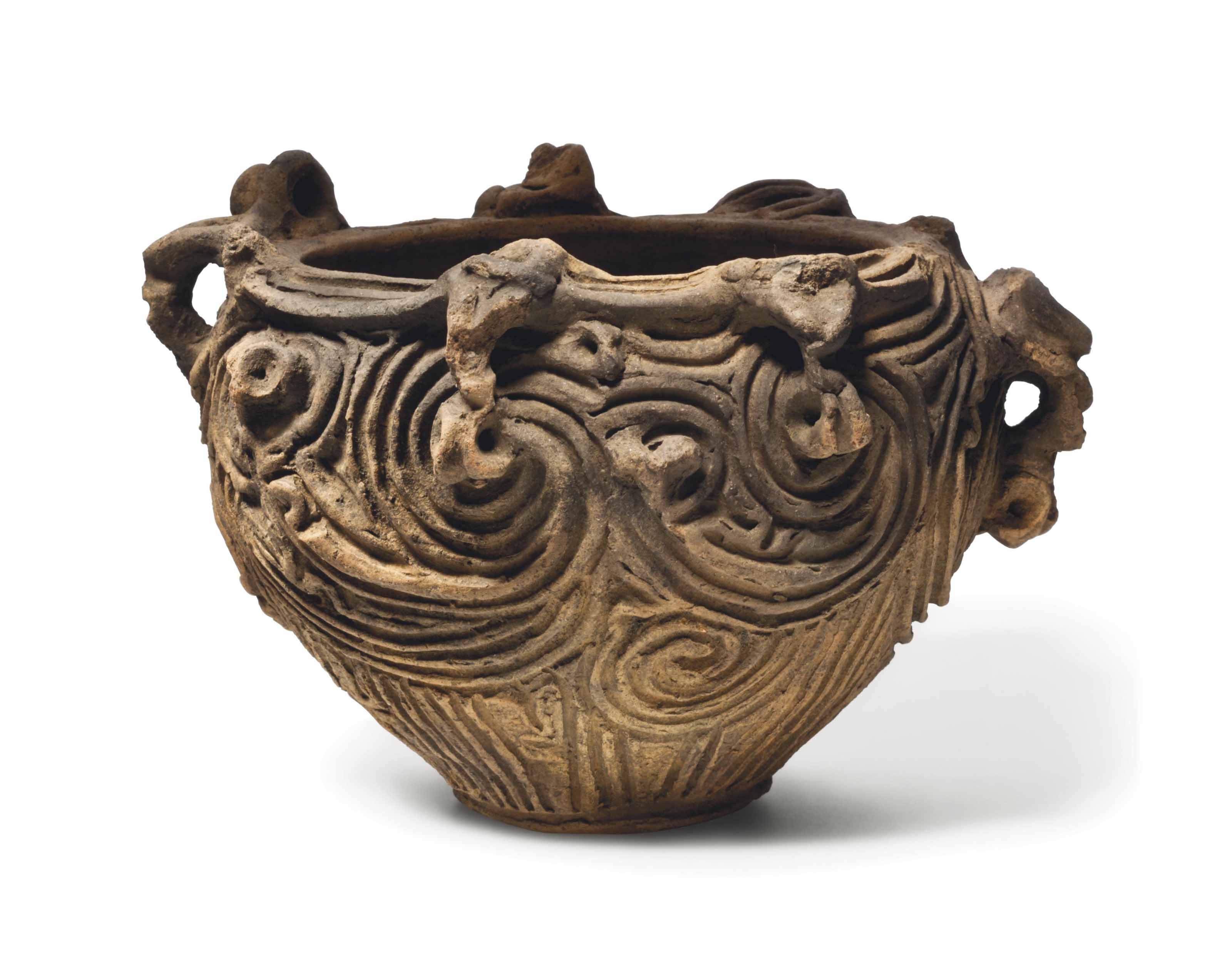 An earthenware vessel with sculptural rim , LATE JOMON PERIOD (5TH