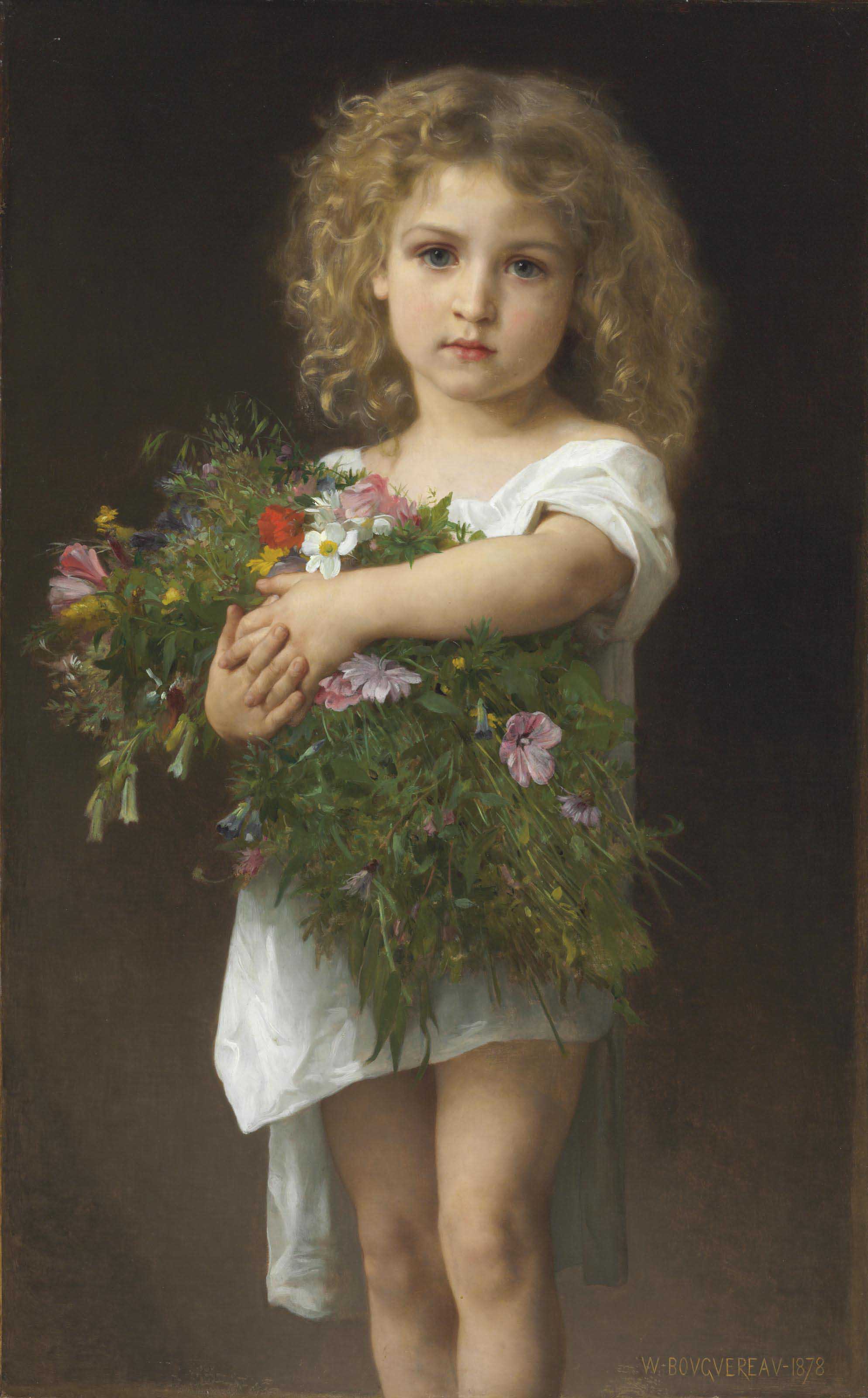 Enfant tenant des fleurs