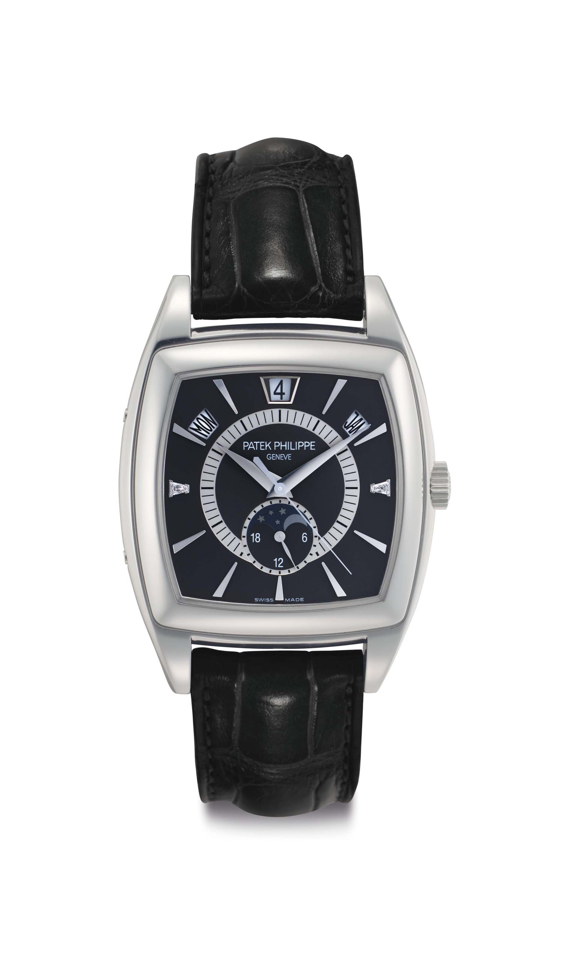 Patek Philippe A Platinum Automatic Tonneau shaped Annual Calendar