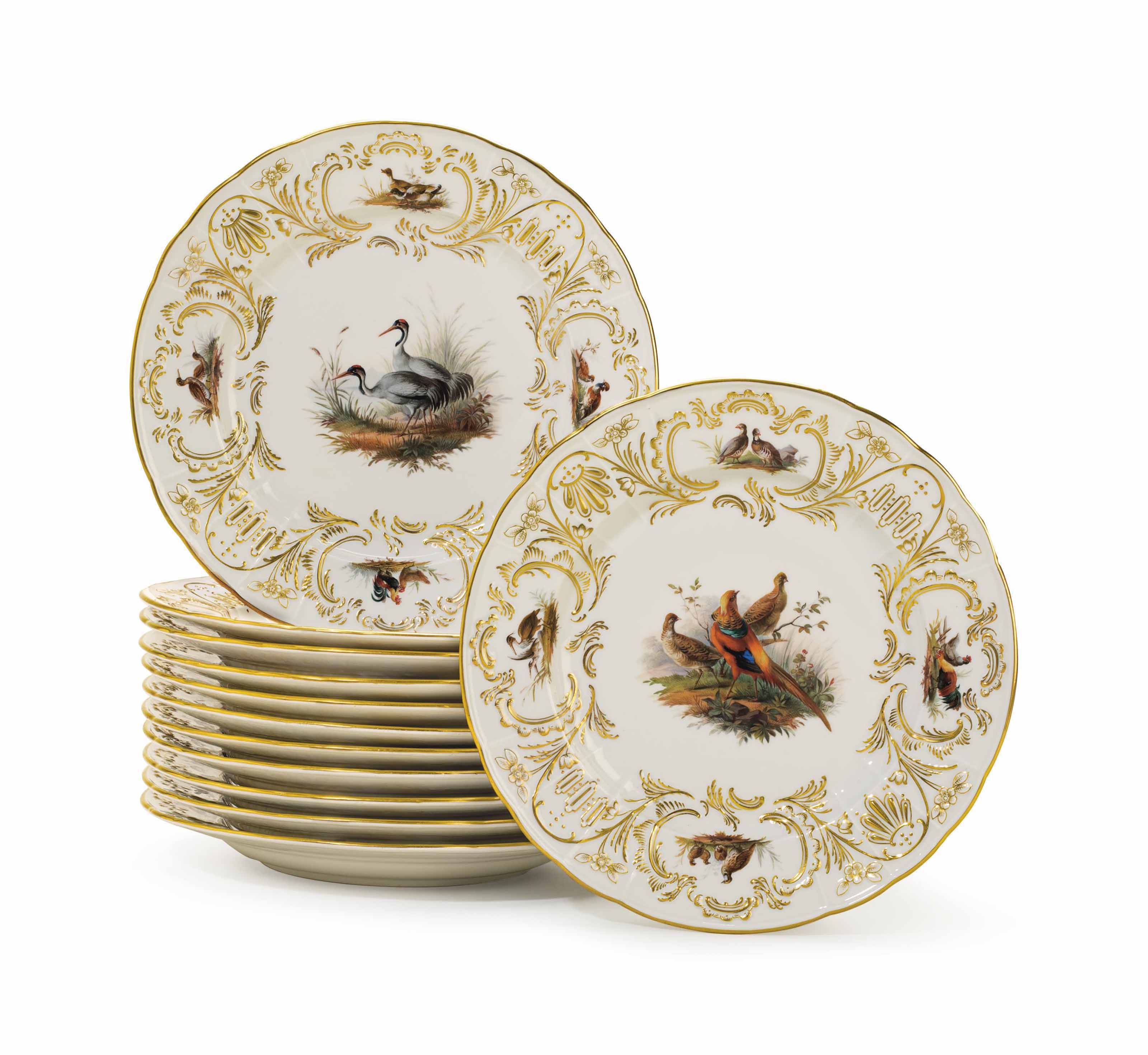 A SET OF TWELVE MEISSEN PORCELAIN GAME PLATES , LATE 19TH/EARLY 20TH