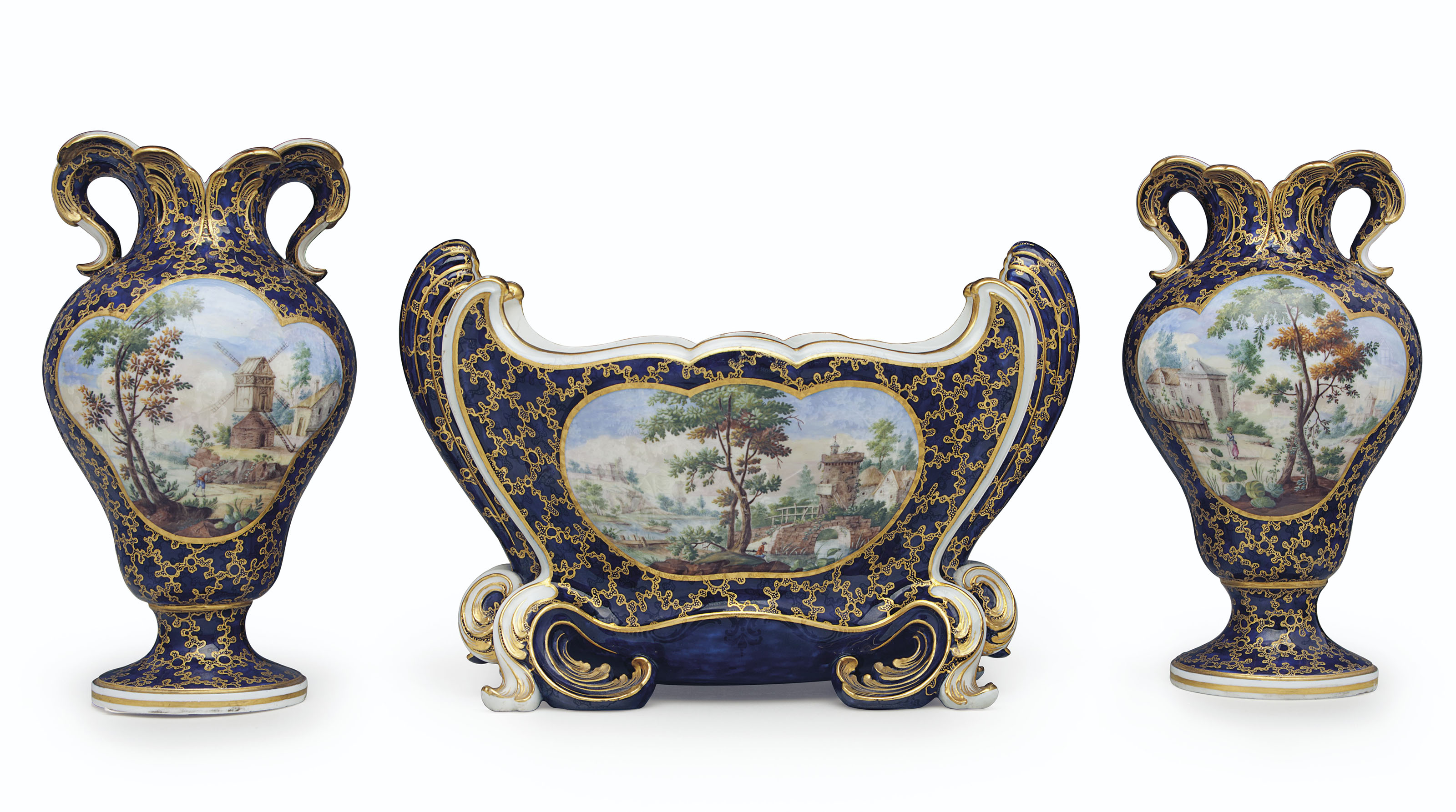 A SEVRES PORCELAIN BLEU NOUVEAU AND GILT VERMICULE THREE ...